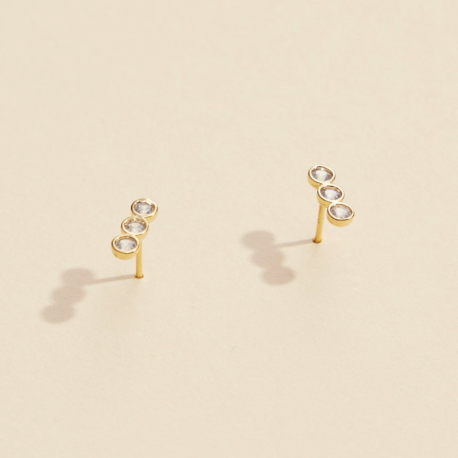 Three Linked Rhinestones Gold Dip Stud Earrings