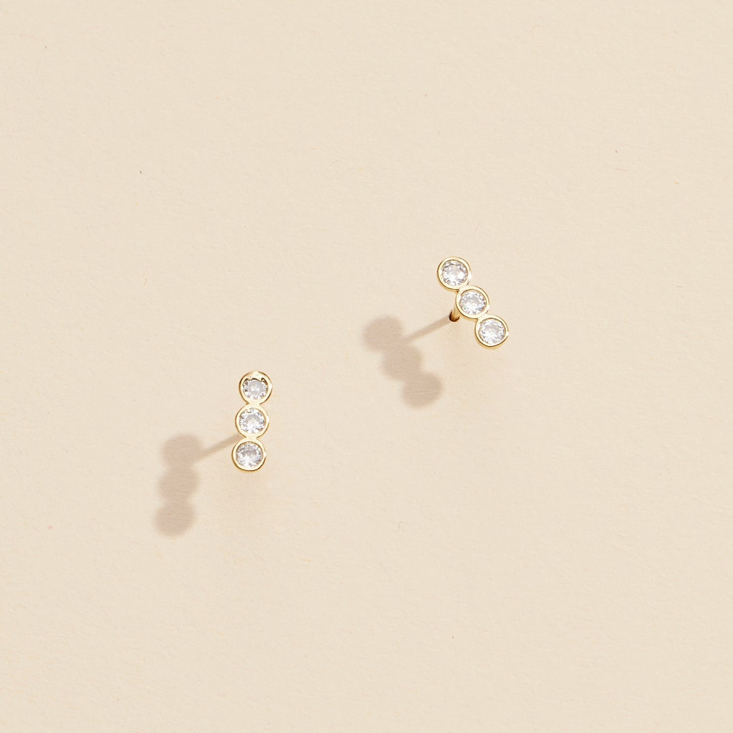 Three Linked Rhinestones Gold Dip Stud Earrings
