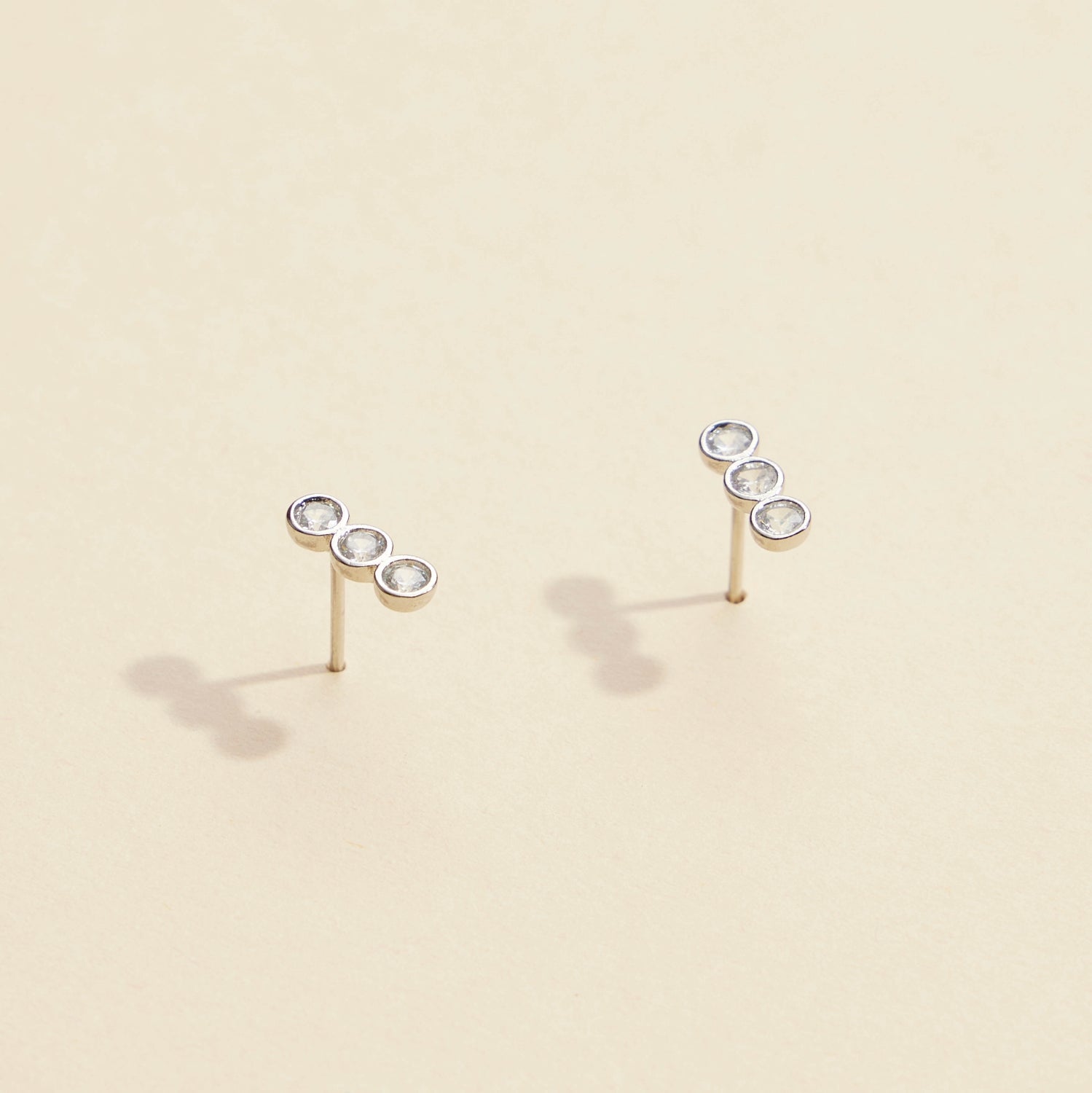 Three Linked Rhinestones Gold Dip Stud Earrings