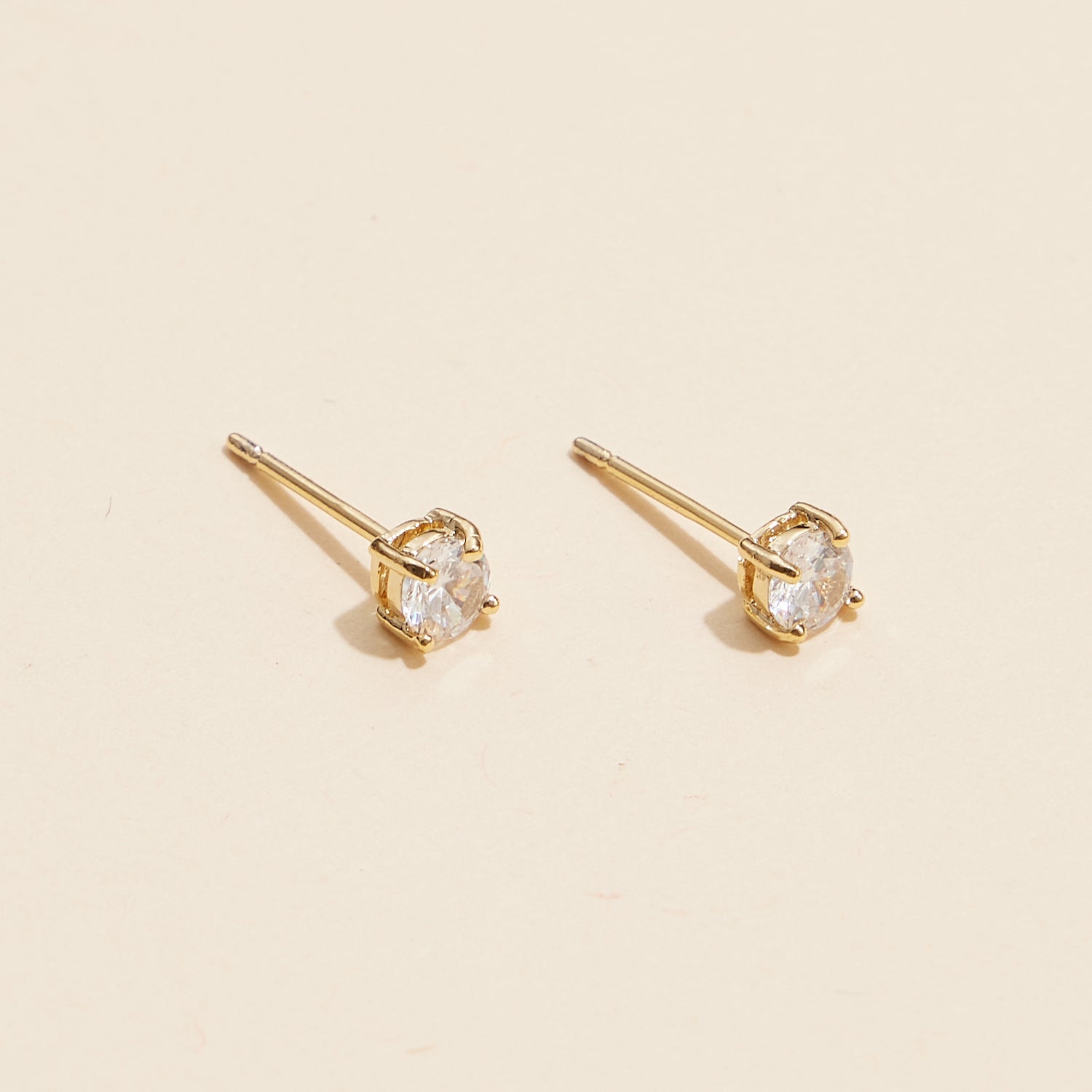 Timeless Gold and White Gold Stud Earrings with Sparkling Gemstones