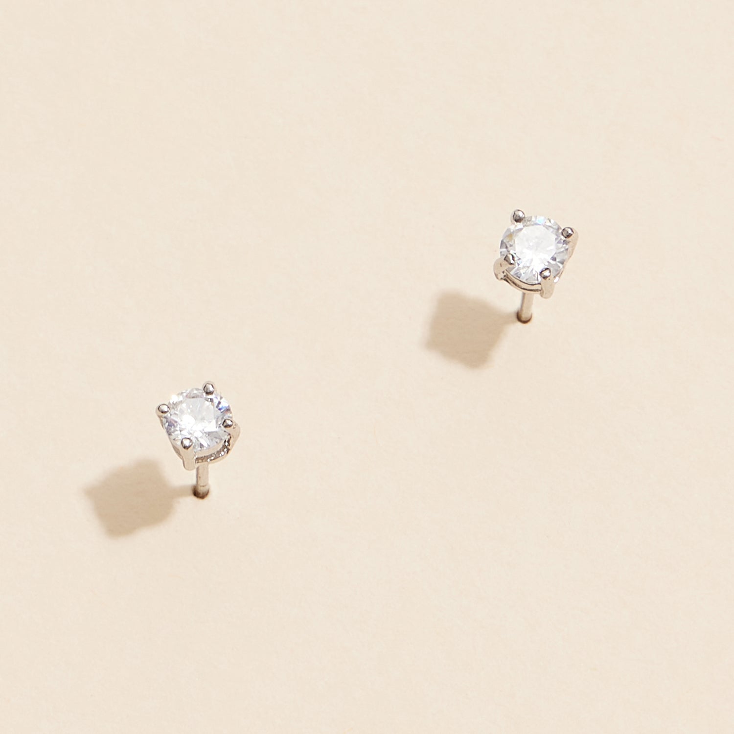 Timeless Gold and White Gold Stud Earrings with Sparkling Gemstones
