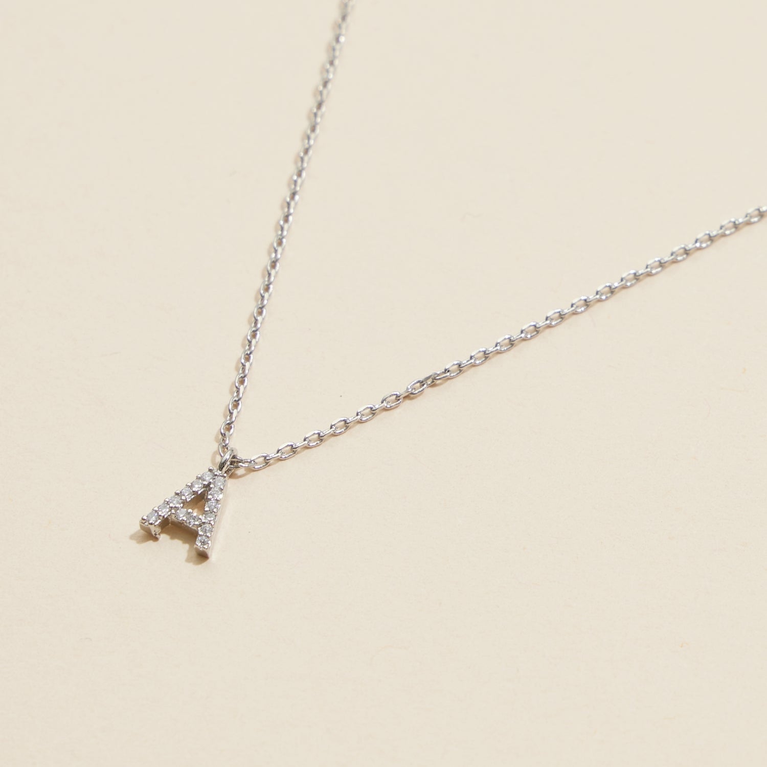 12 Gold-Plated Initial Necklaces with Cubic Zirconia Detailing