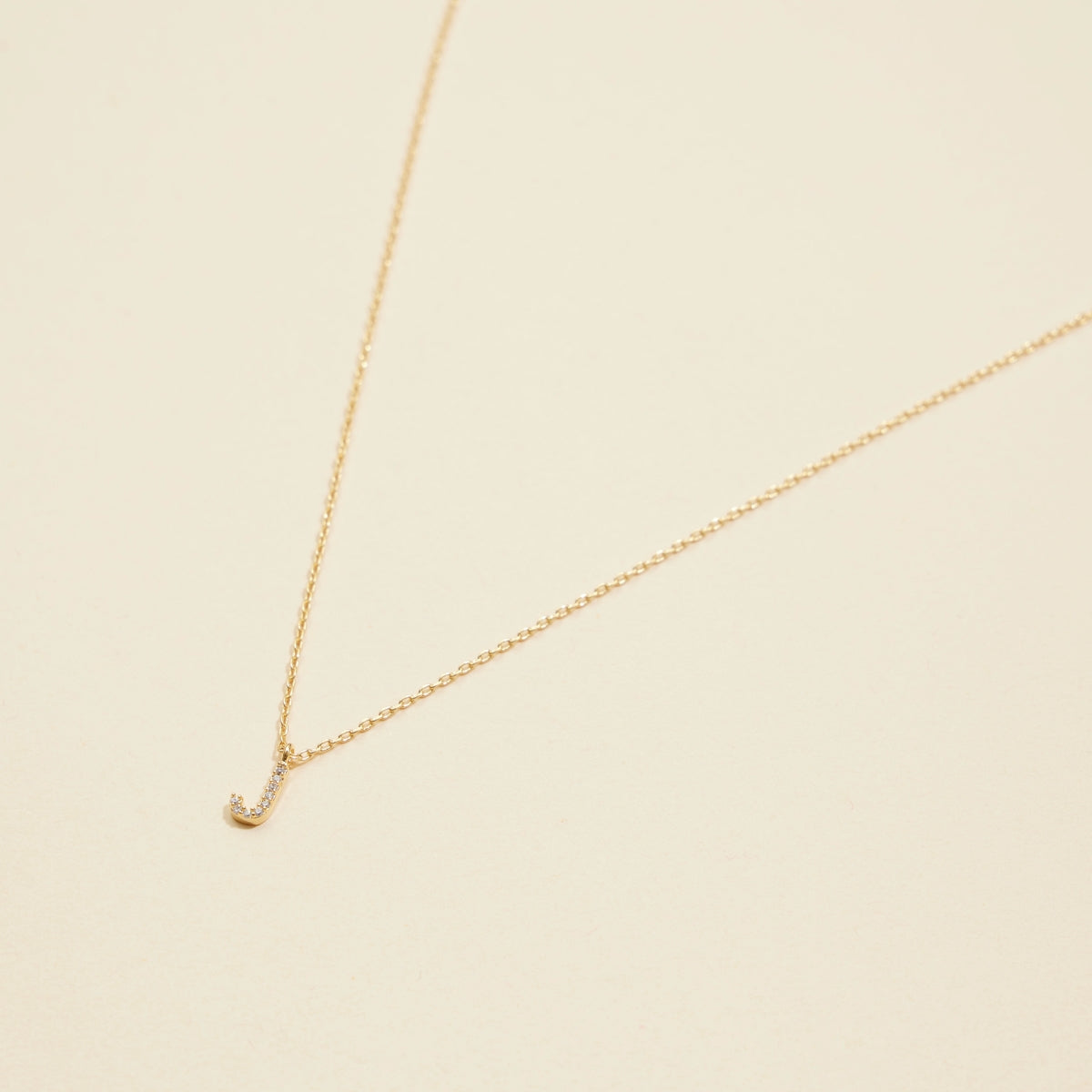 12 Gold-Plated Initial Necklaces with Cubic Zirconia Detailing