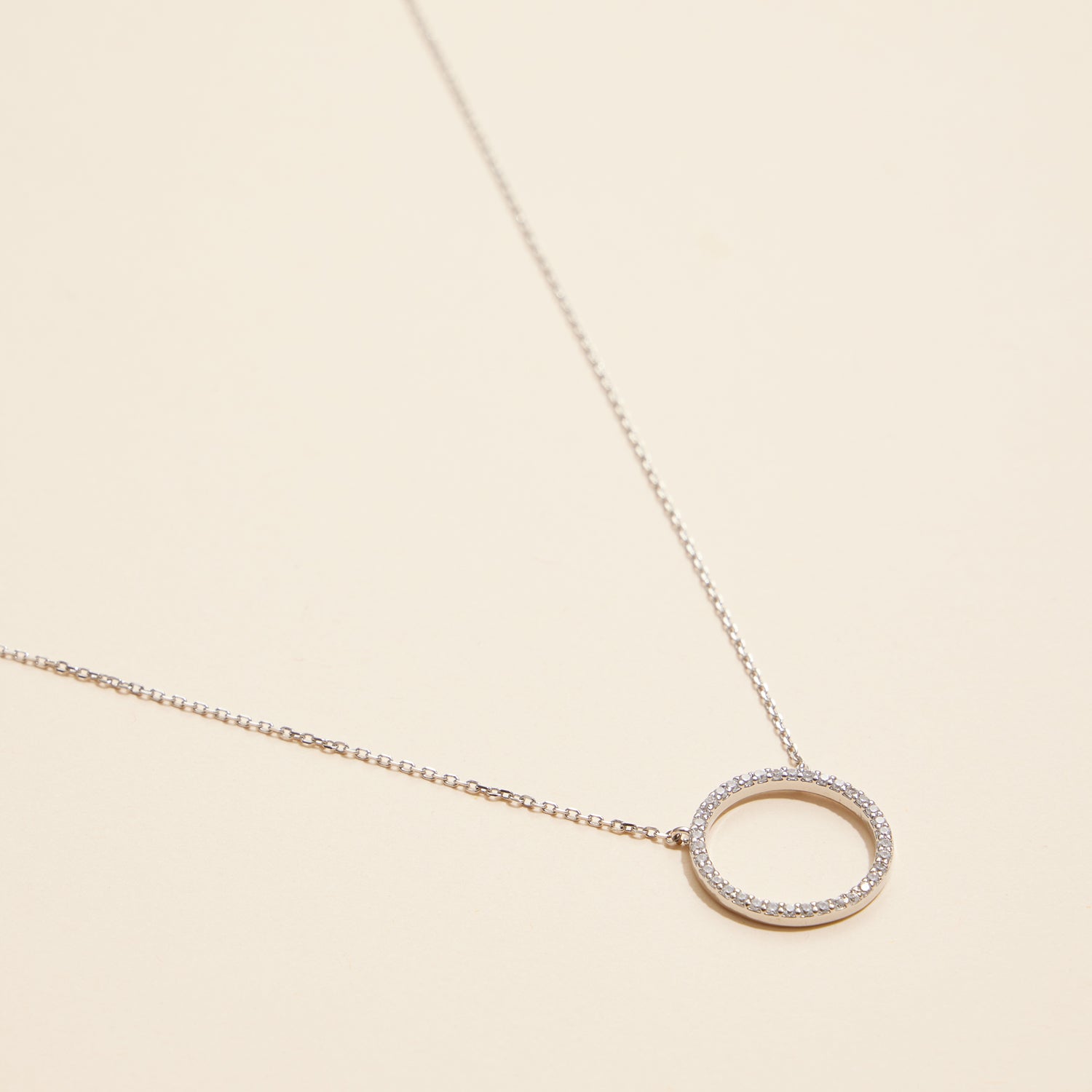 Sophisticated Gold Circle Pendant Necklace with CZ Accents