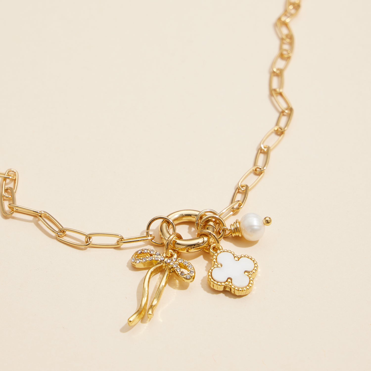 Bow Charm Necklace with Clover and Pearl in 18K Gold Dipped Finish
