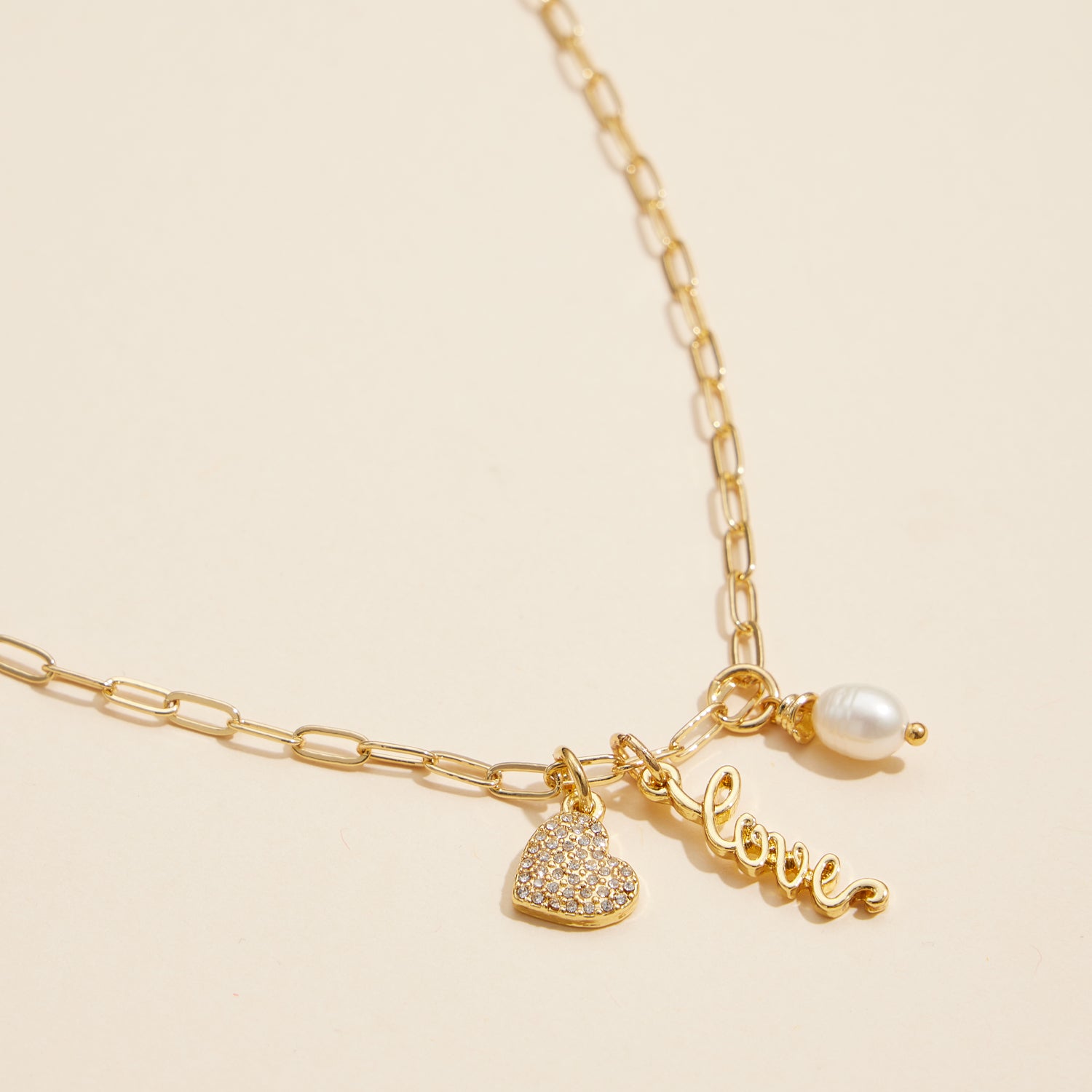 18K Gold Dipped Necklace with "Love" Pendant, Heart, and Pearl Details