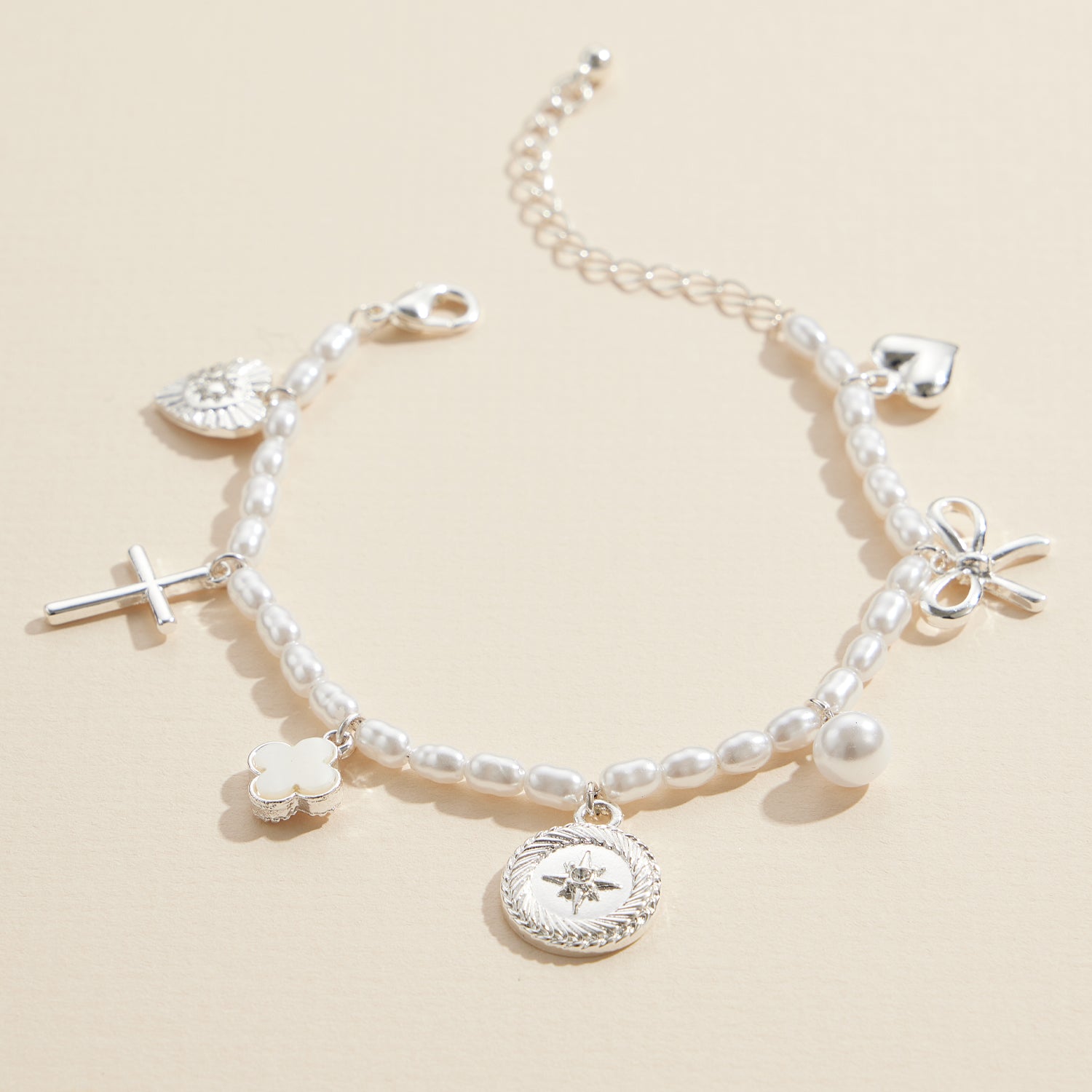 Adjustable Pearl Charm Bracelet with Cross, Heart, Compass, Clover & Bow Pendants
