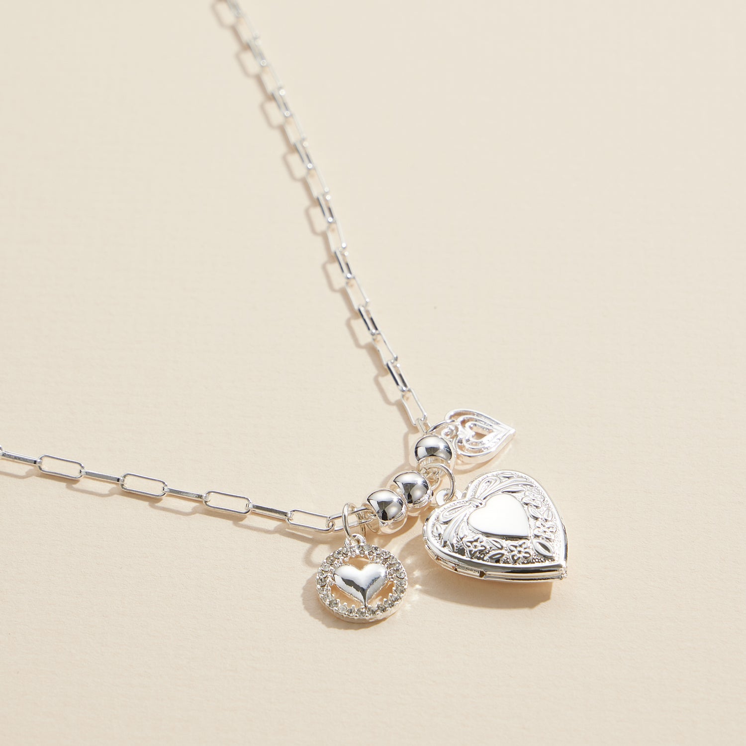 Elegant Layered Chain Necklace with Heart Charm Locket
