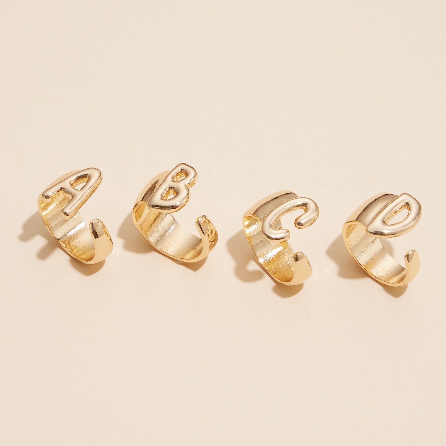 Bubble Shaped Initial Rings in Gold