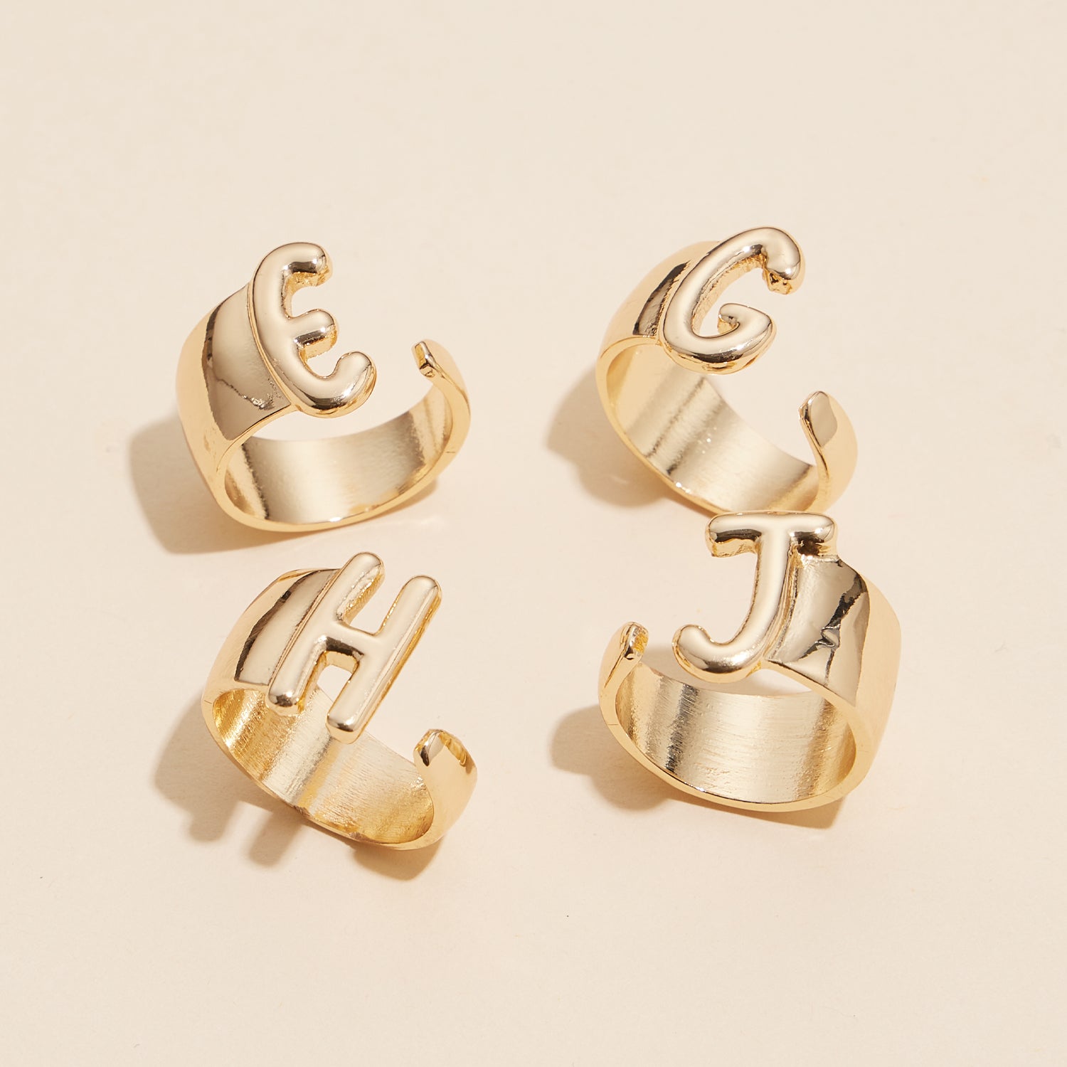 Bubble Shaped Initial Rings in Gold