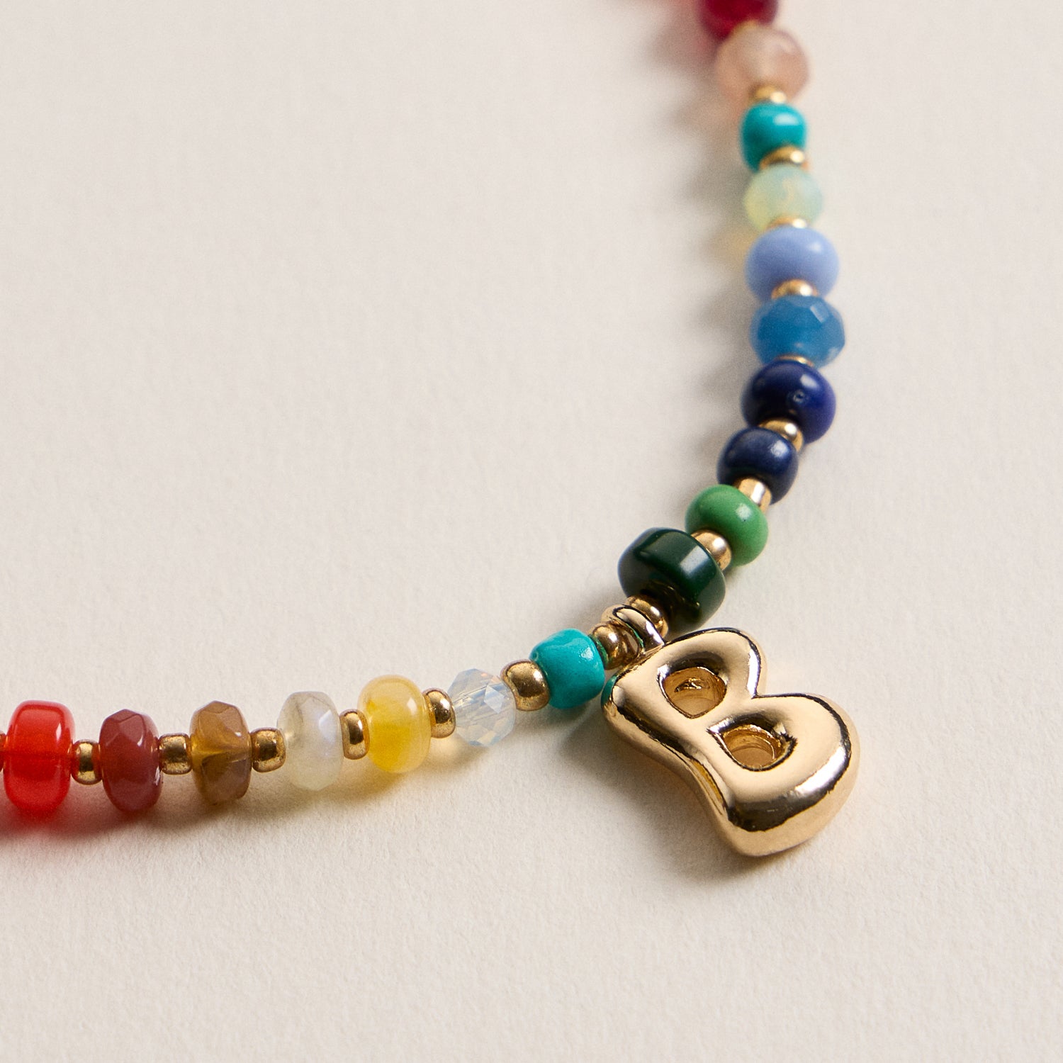 Vibrant Beaded Necklace with Personalized Gold Initial Charm
