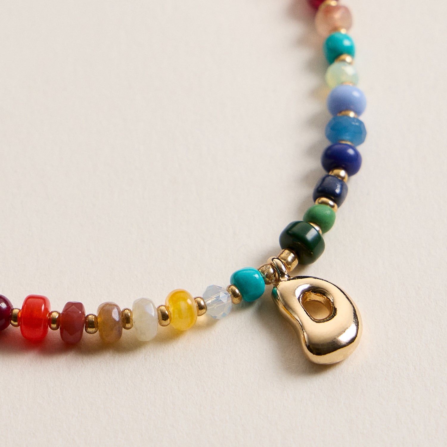 Vibrant Beaded Necklace with Personalized Gold Initial Charm