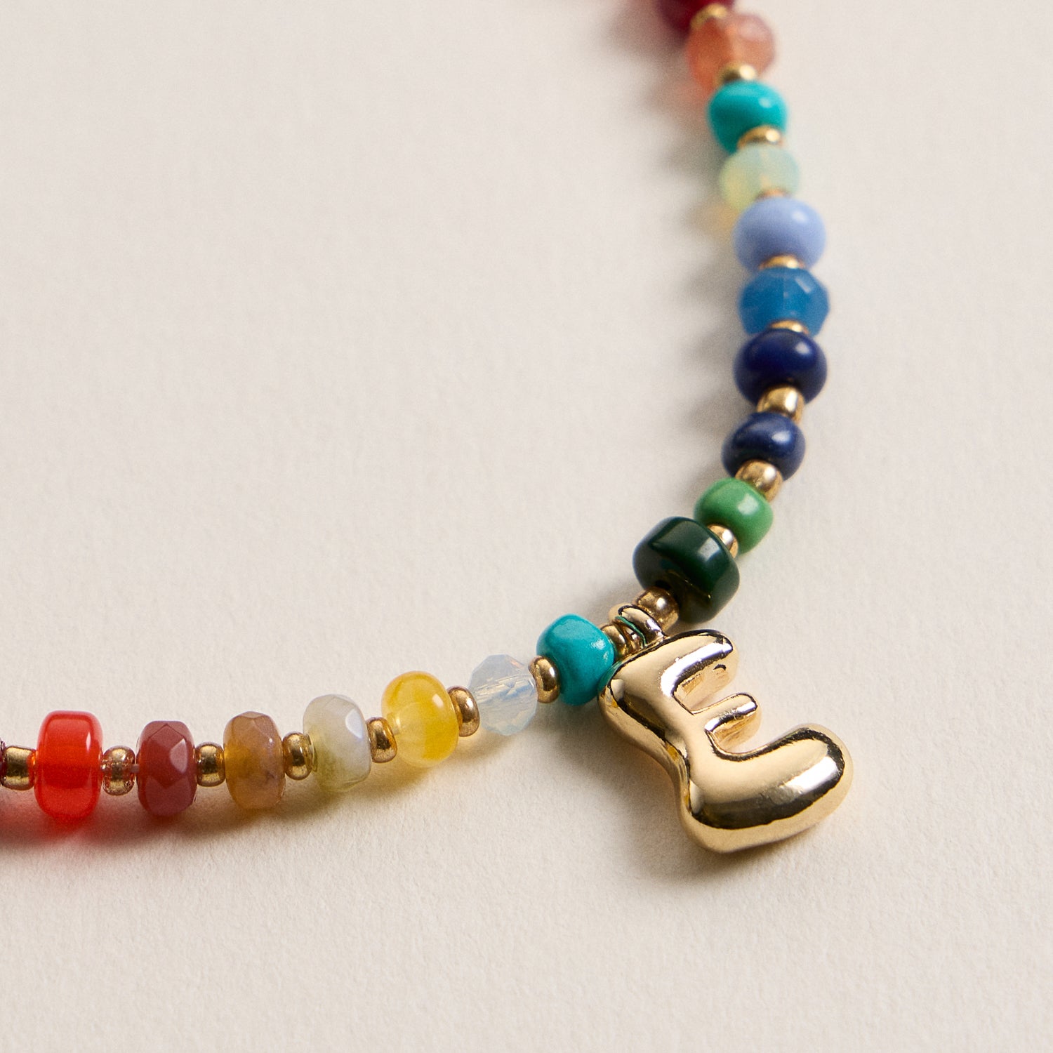 Vibrant Beaded Necklace with Personalized Gold Initial Charm