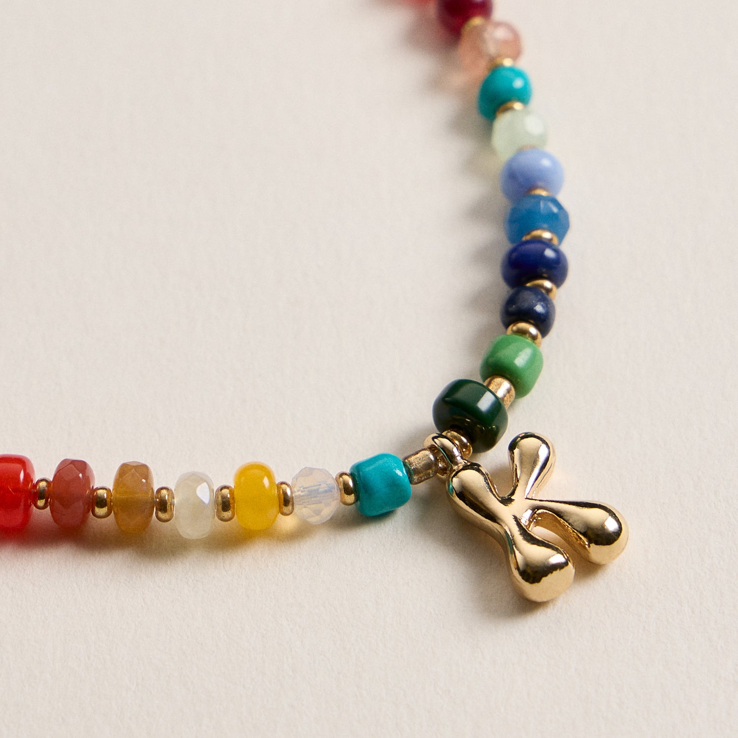 Vibrant Beaded Necklace with Personalized Gold Initial Charm