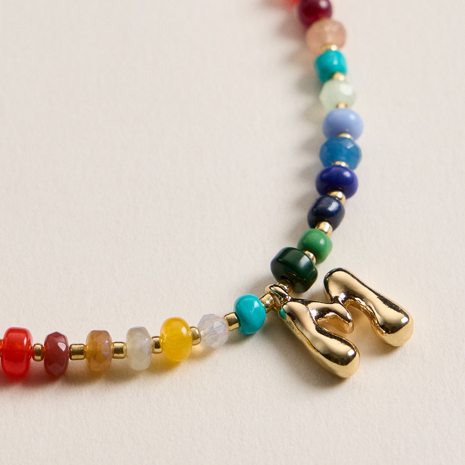 Vibrant Beaded Necklace with Personalized Gold Initial Charm