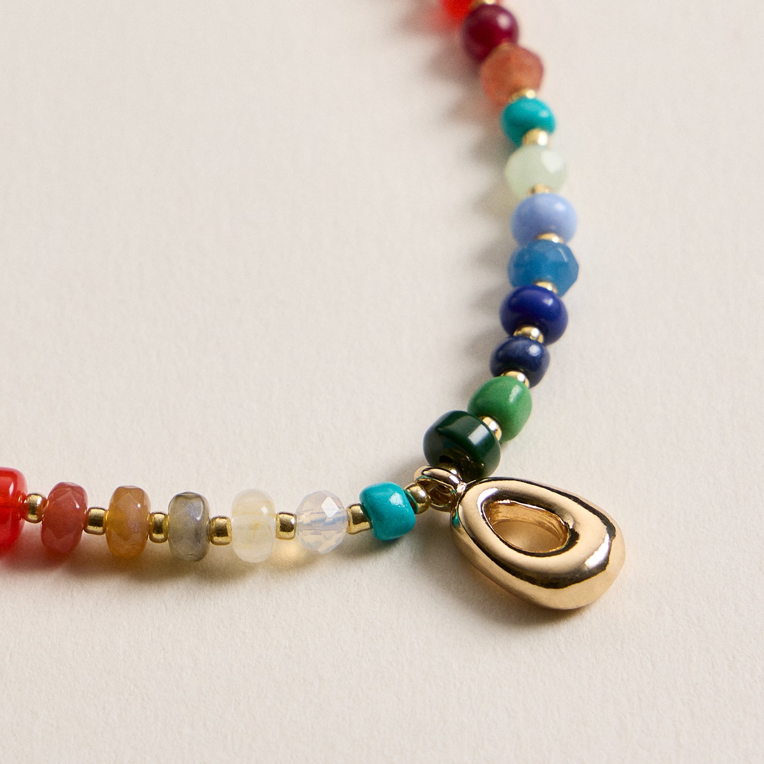 Vibrant Beaded Necklace with Personalized Gold Initial Charm