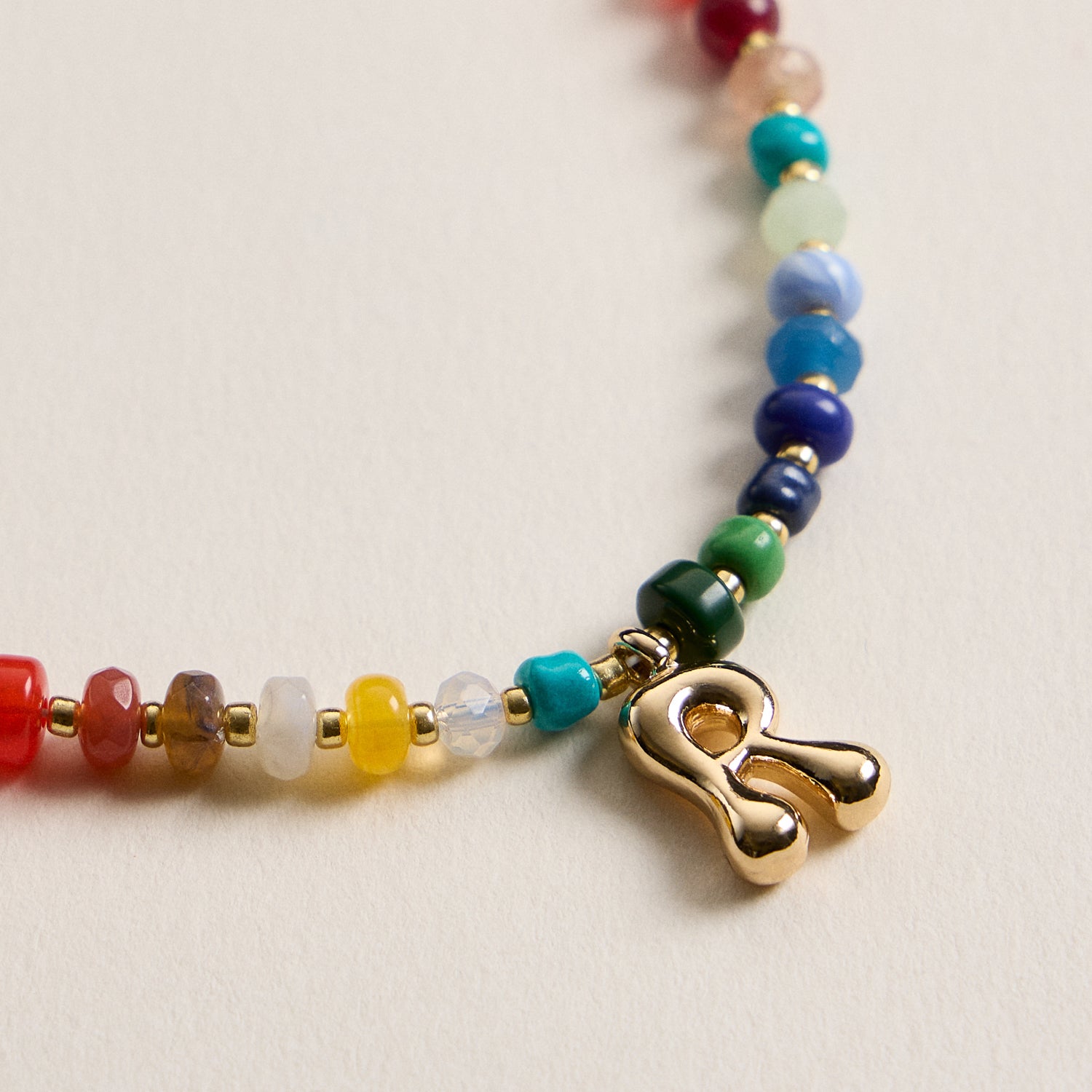 Vibrant Beaded Necklace with Personalized Gold Initial Charm