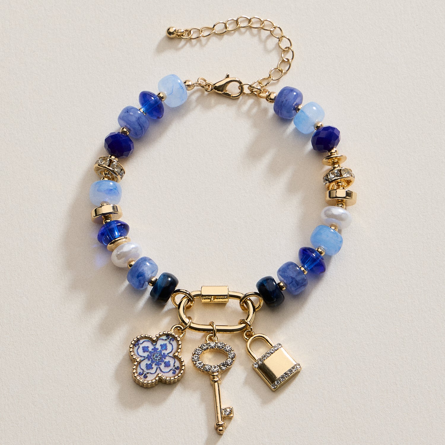 Vibrant Beaded Bracelet with Gold-Tone Trio Charms