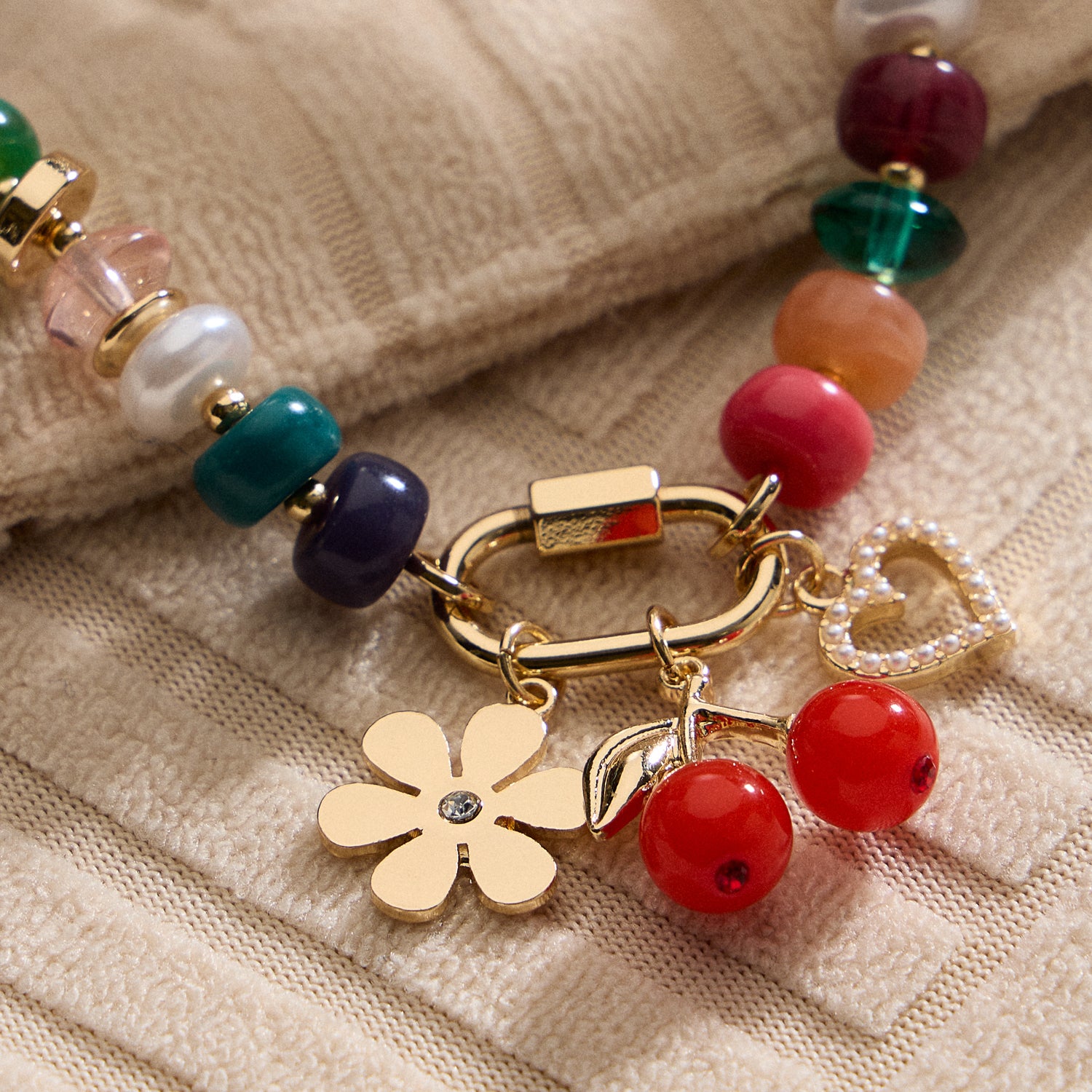 Vibrant Beaded Bracelet with Gold-Tone Trio Charms