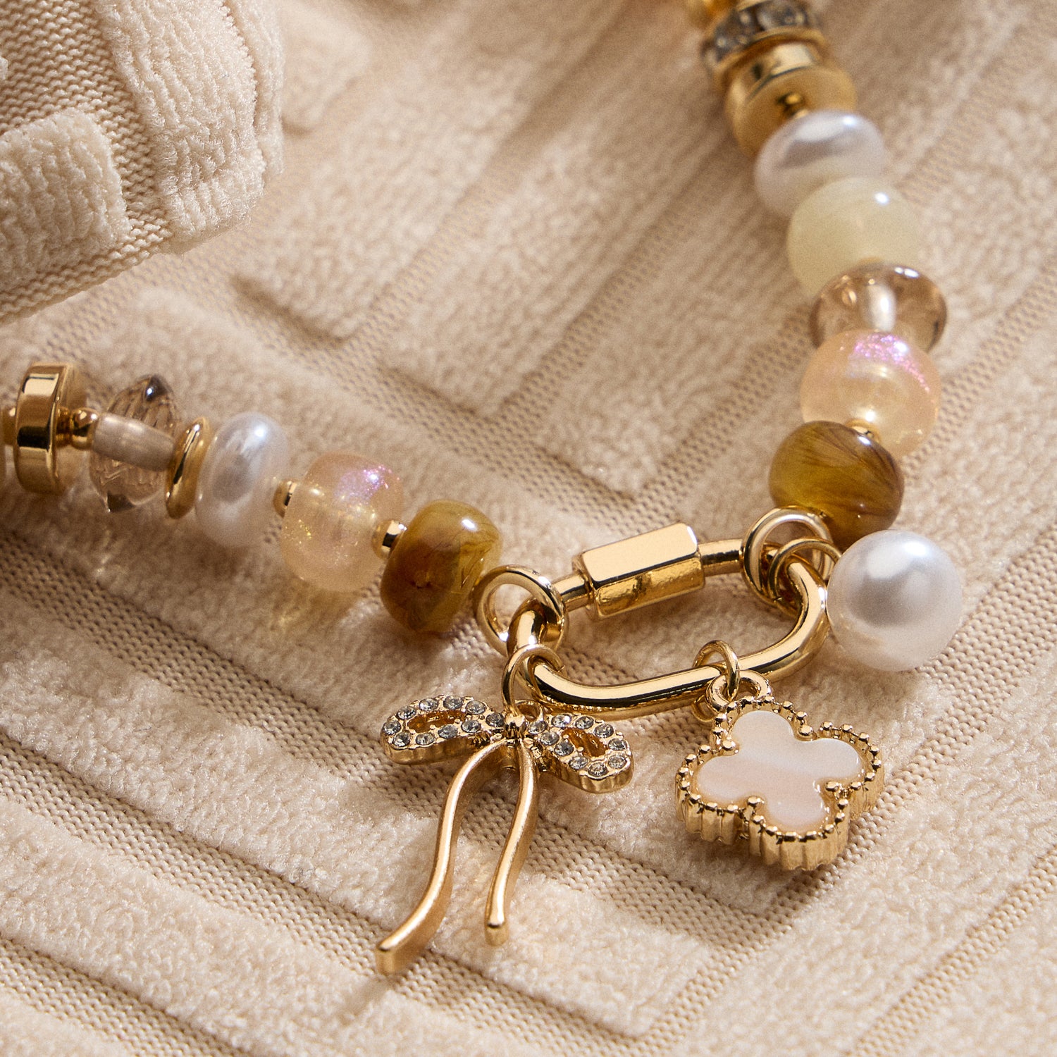 Vibrant Beaded Bracelet with Gold-Tone Trio Charms
