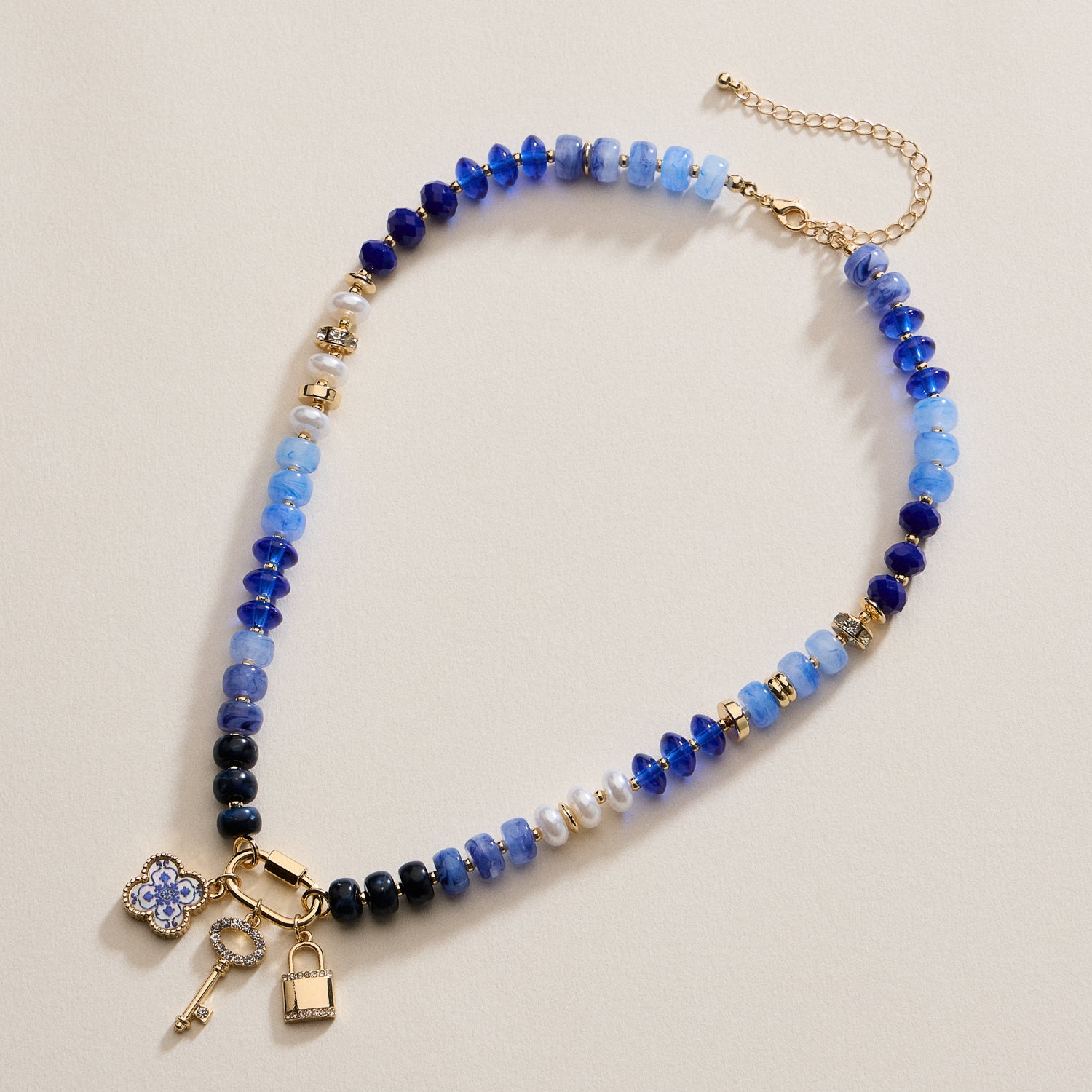 Layered Glass Bead Necklace with Trio of Charms