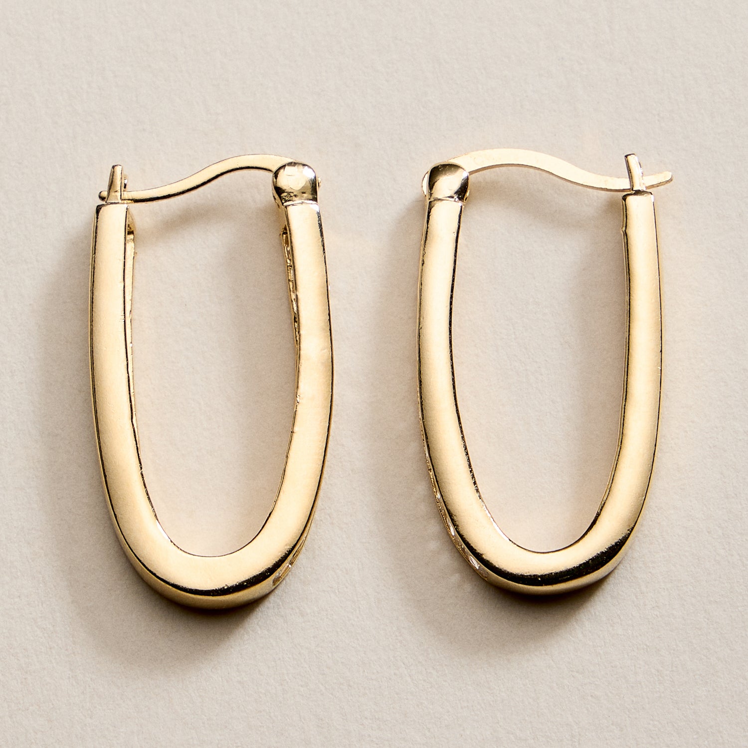 Gold Filled Oval Hoop Earrings with Channel Set CZ Stones