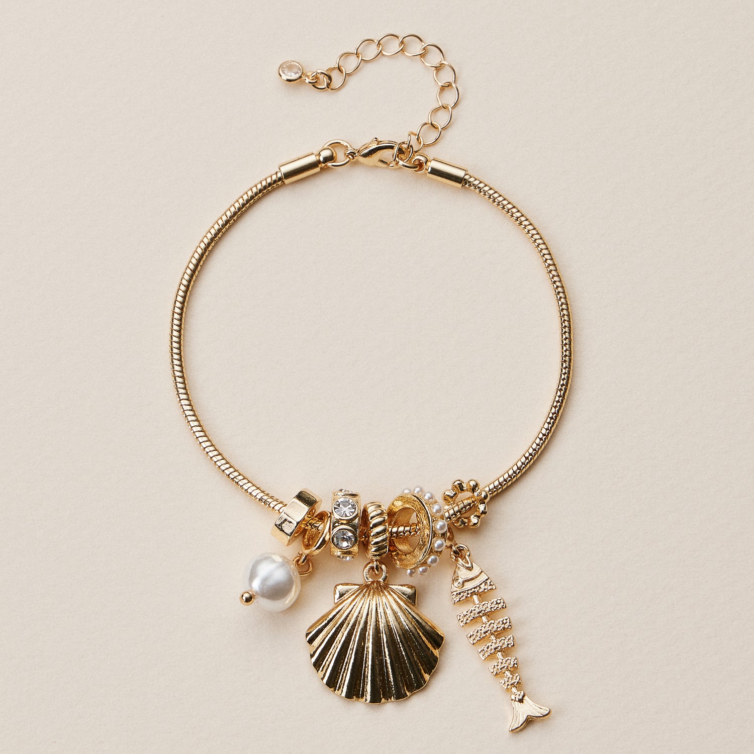 Gold Dipped Multi Charm Bracelet – Symbolic Pendant Collection