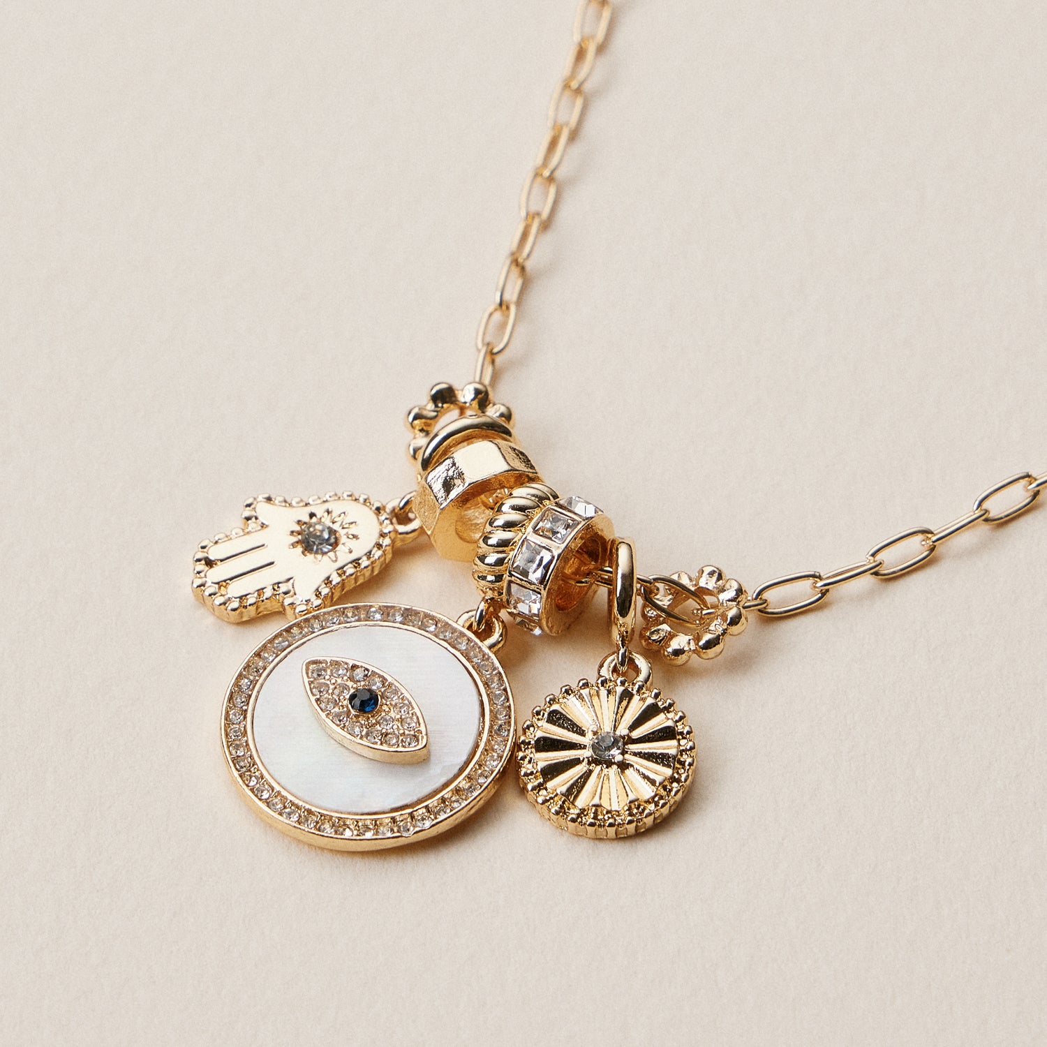 Gold Dipped Symbolic Multi Charm Necklace Collection