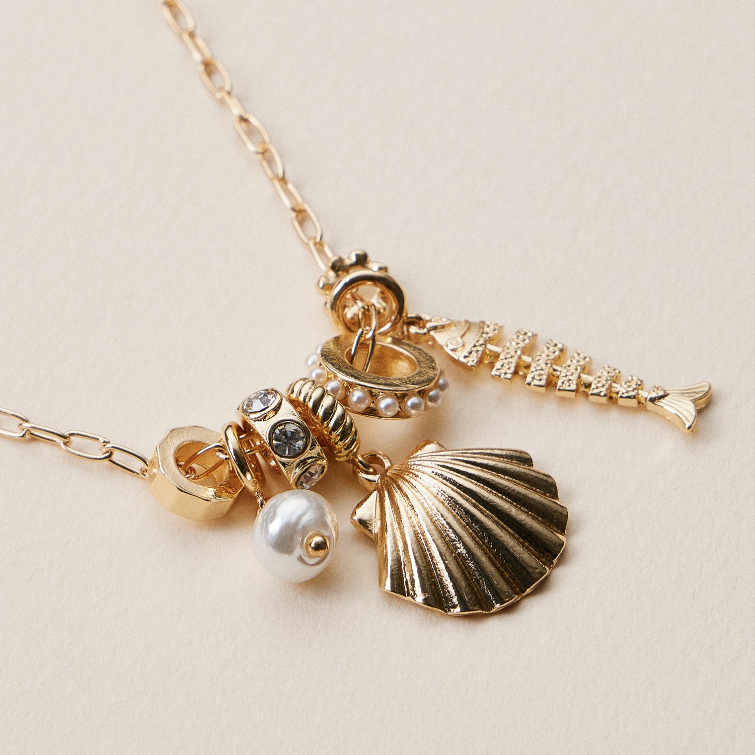 Gold Dipped Symbolic Multi Charm Necklace Collection