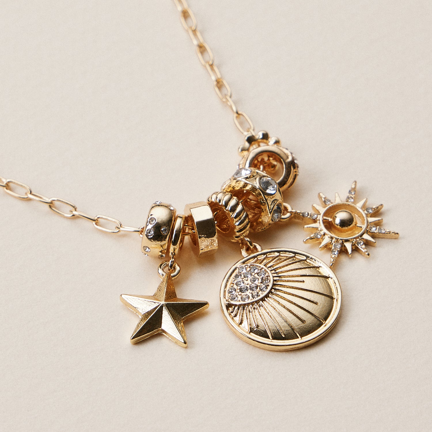 Gold Dipped Symbolic Multi Charm Necklace Collection