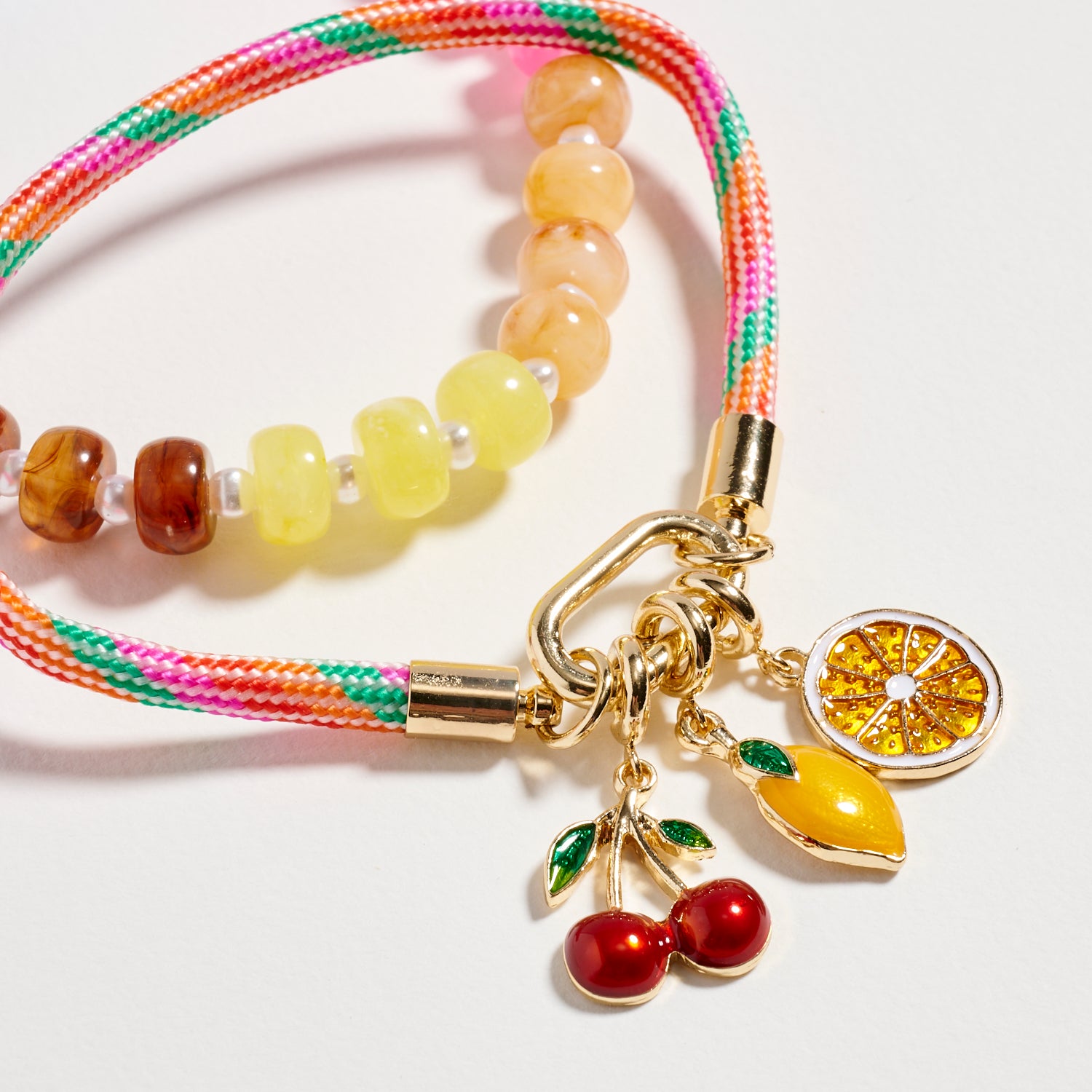 Double Layer Beaded Stretch & Cord Bracelet with Gold Tone Charms - Frem