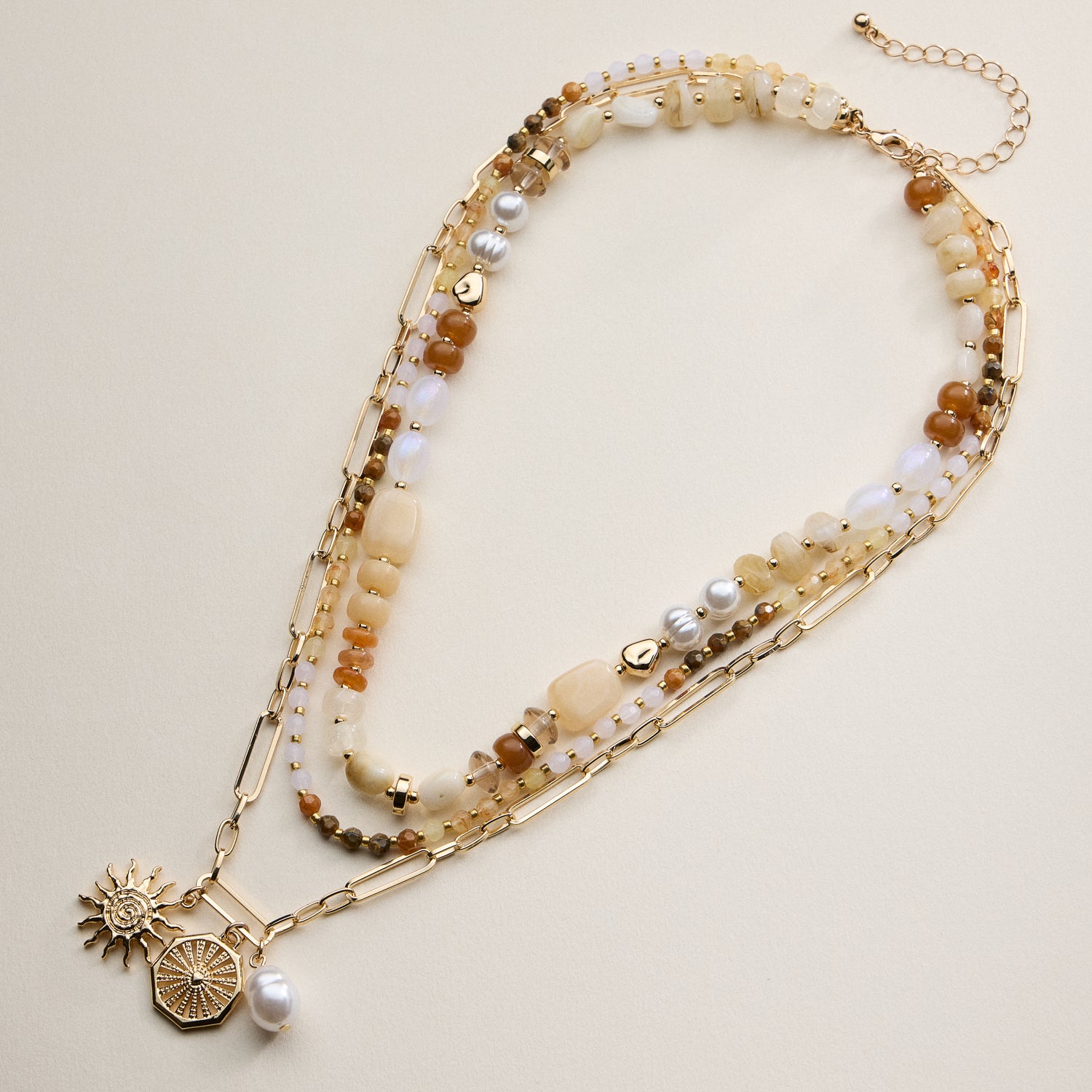 Layered Beaded and Chain Necklace with Sun and Pearl Charms – Gold Accent Design