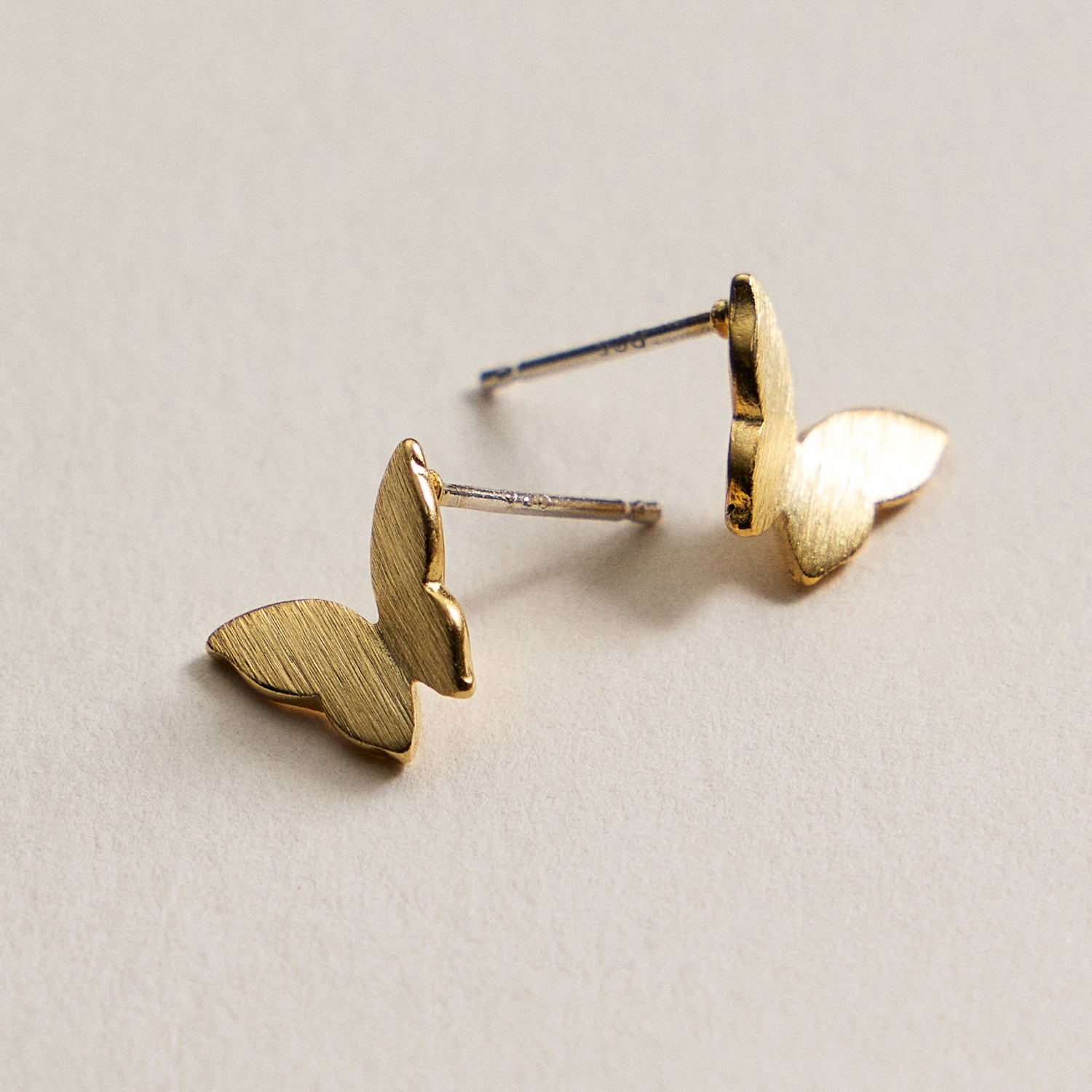 Gold Dipped Butterfly Stud Earrings – Minimalist Brushed Metal Design
