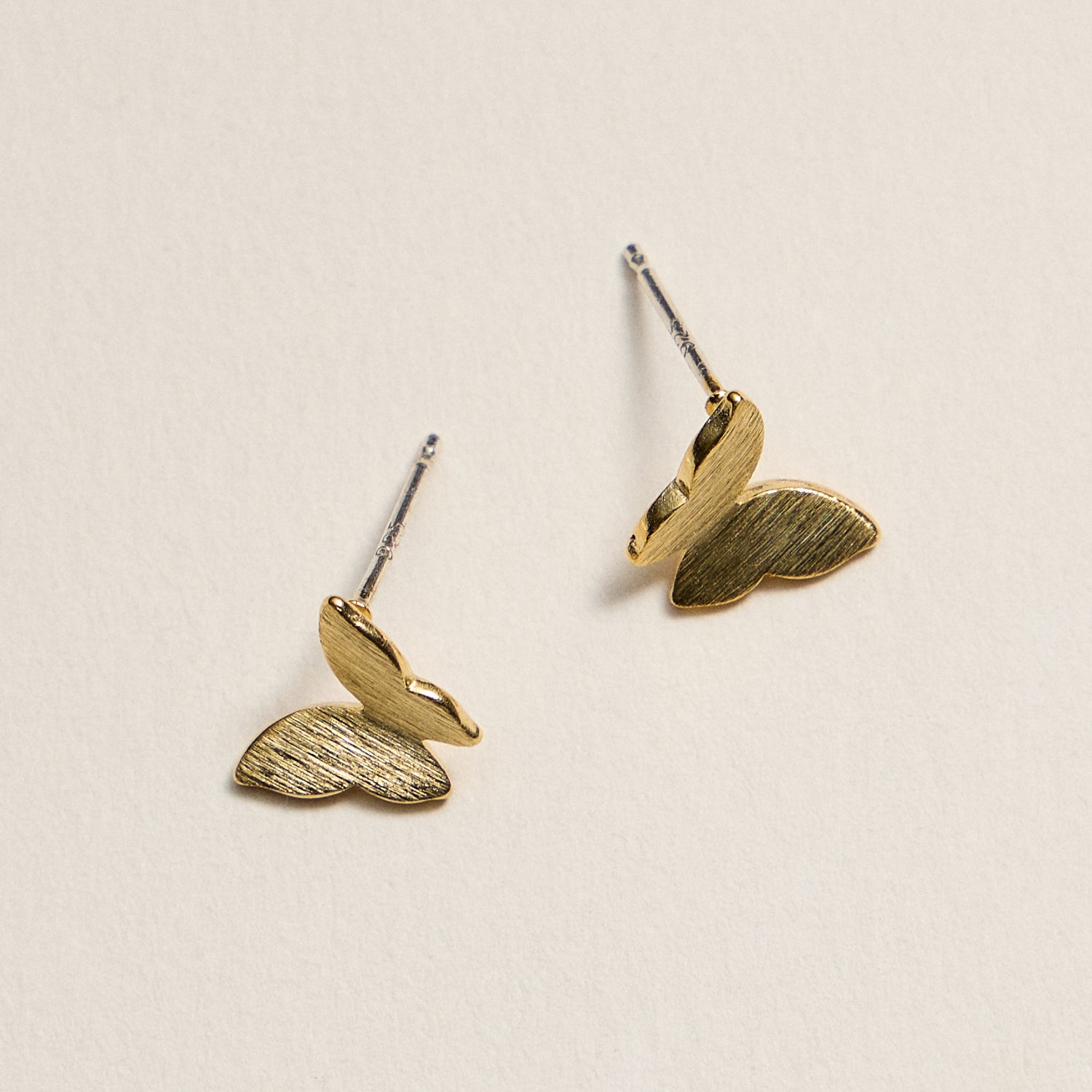 Gold Dipped Butterfly Stud Earrings – Minimalist Brushed Metal Design