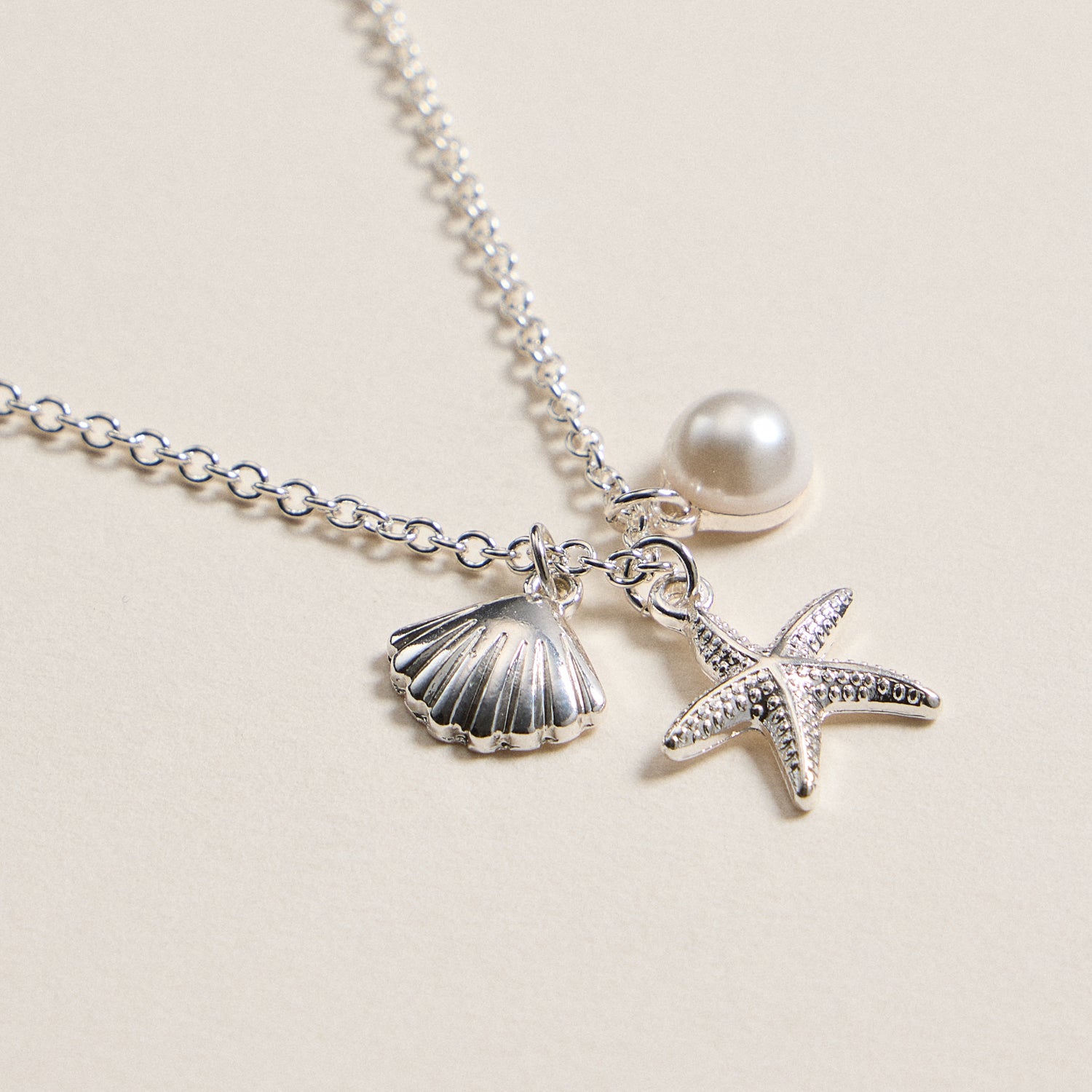 Coastal Charm Necklace with Starfish, Seashell & Pearl Accents