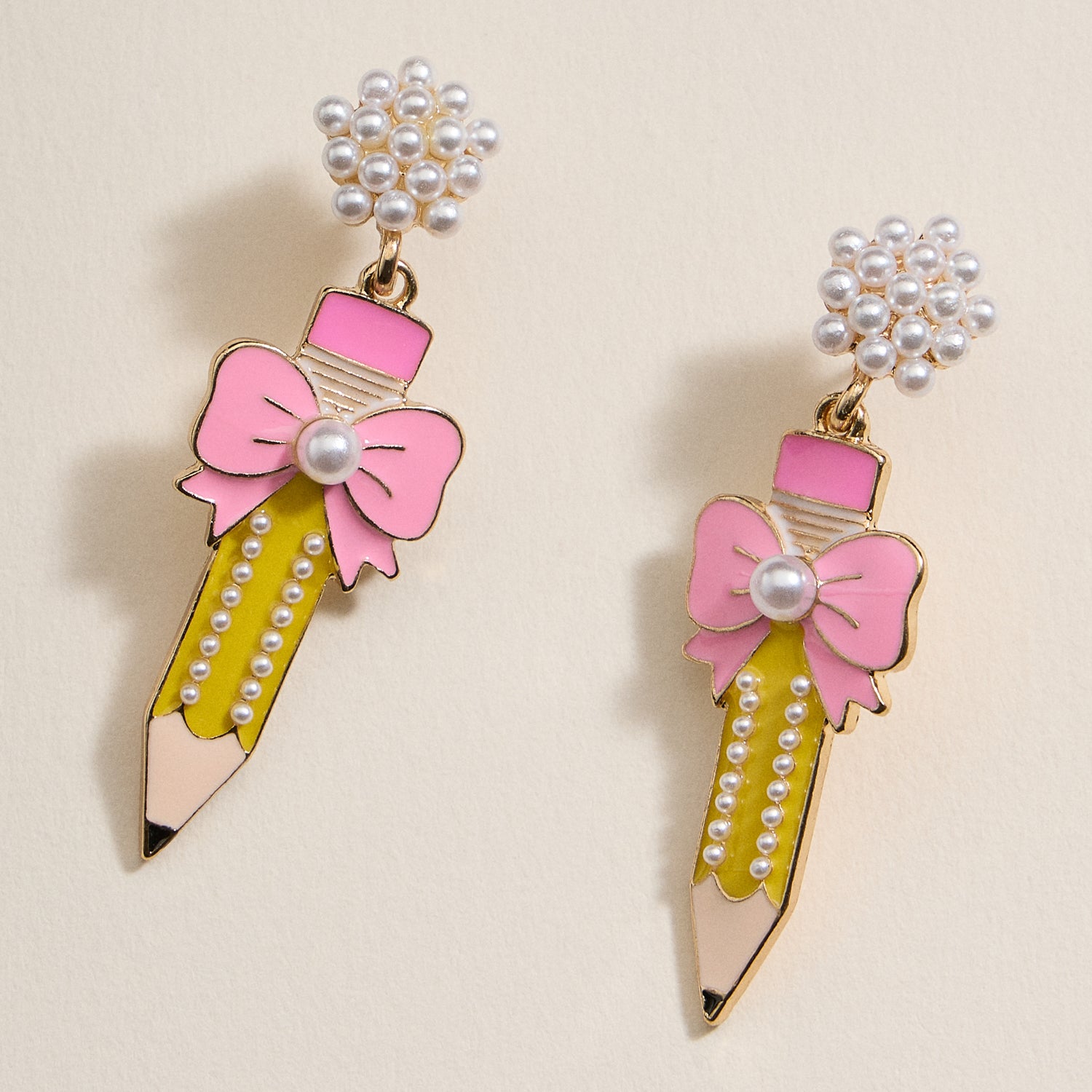 Elegant Pencil and Bow Pearl Earrings