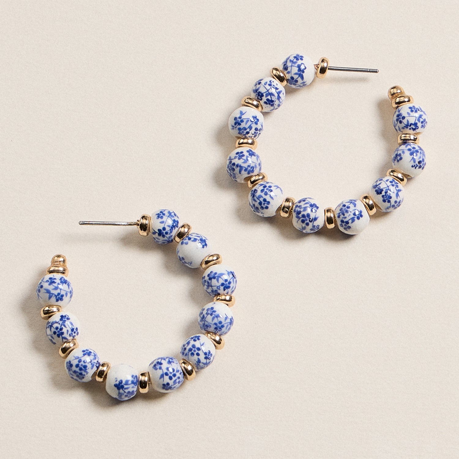 Handcrafted Ceramic Hoop Earrings with Delicate Floral Beads