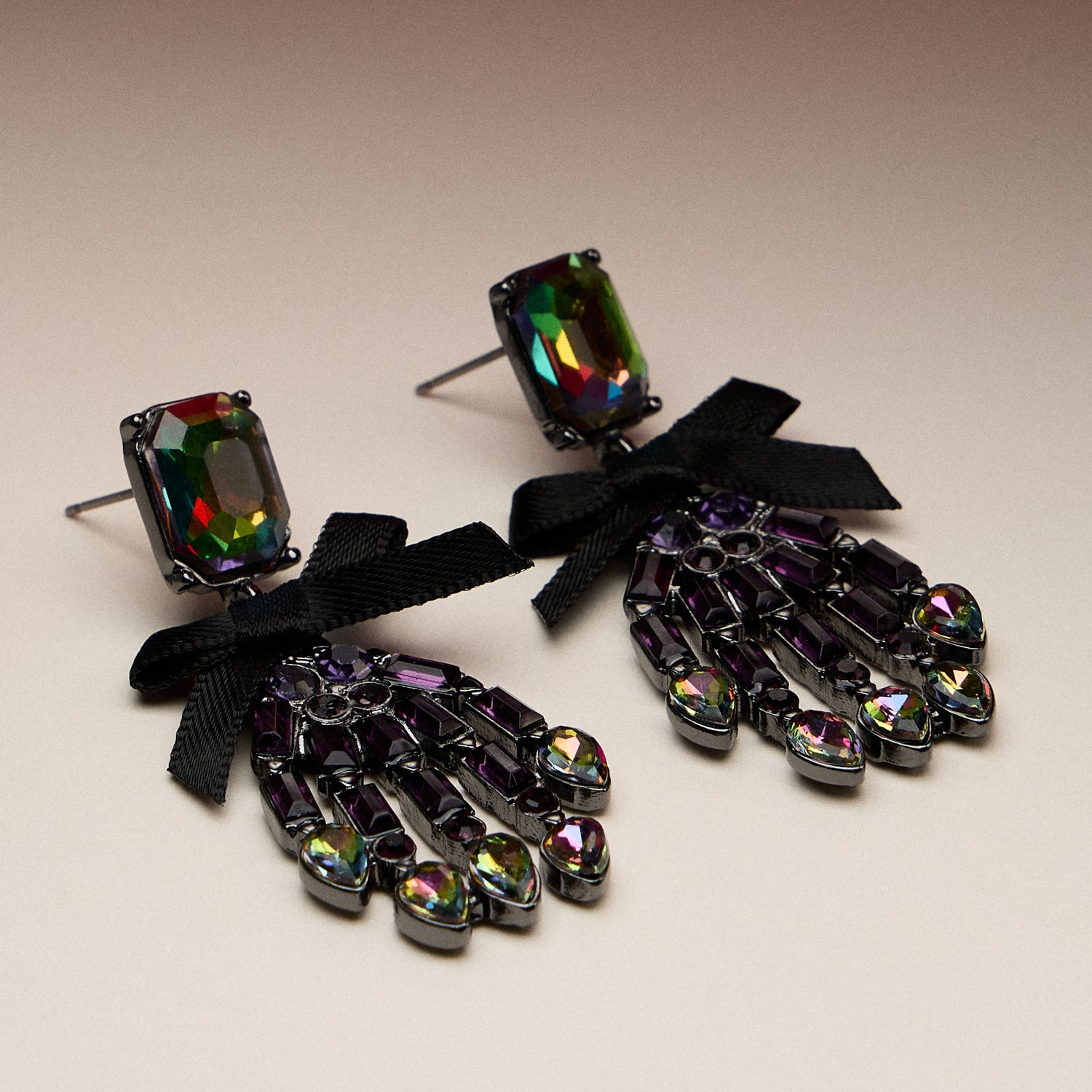 Enamel Hand Earrings with Sculpted Skeleton Form and Ribbon Detail