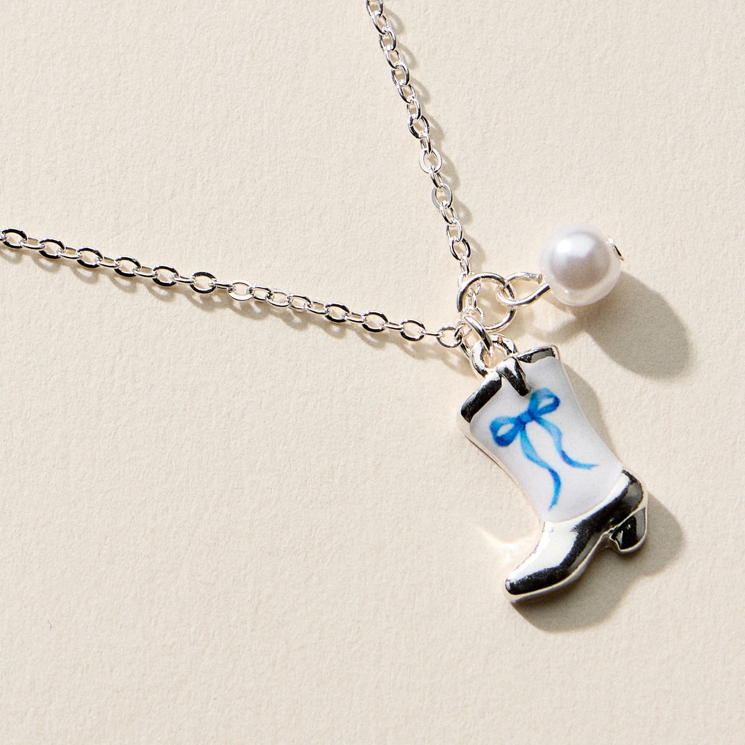 Boot Enamel Necklace – Cowboy Boot Pendant with Printed Detail & Pearl Accent - Frem