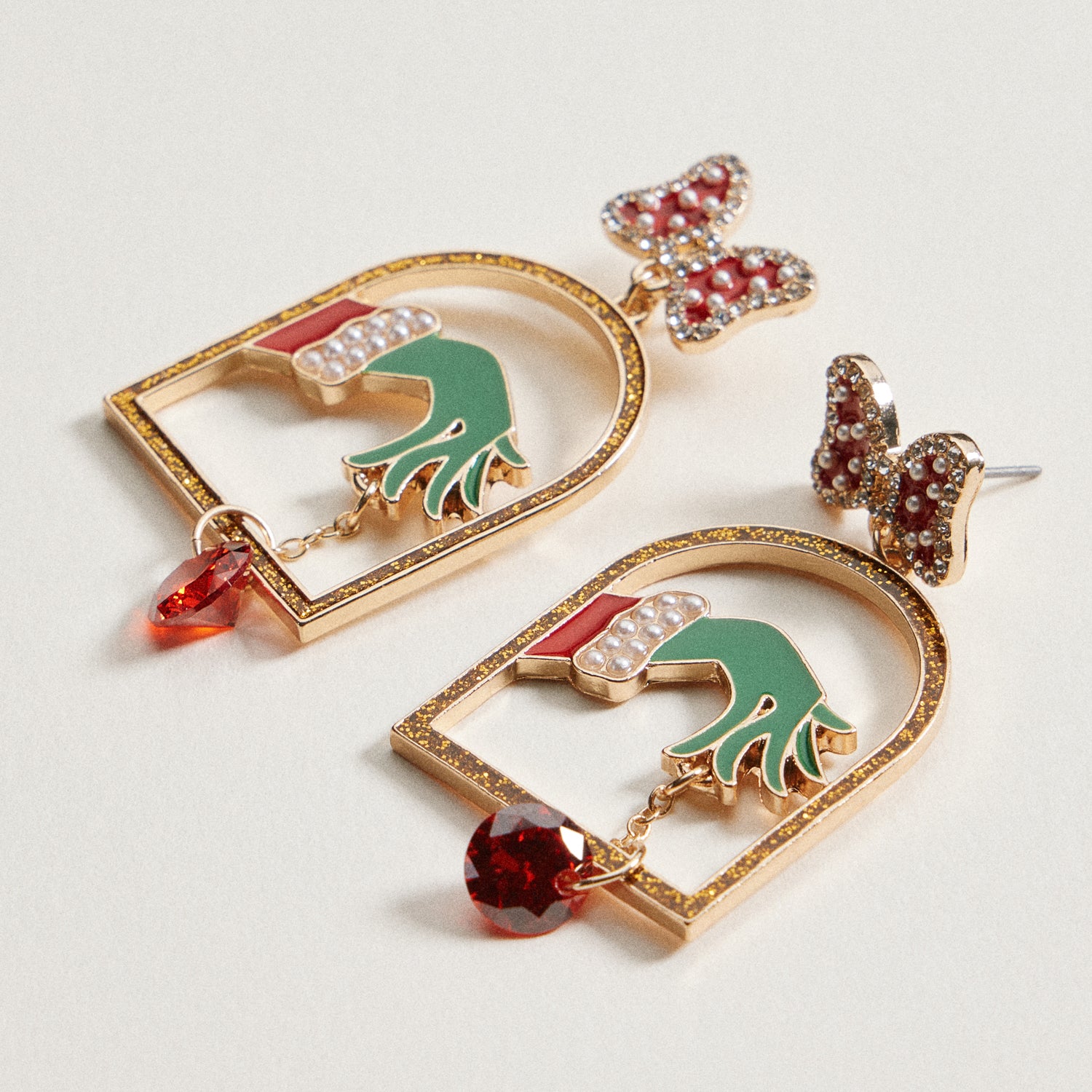 Enamel Green Monster Hand Earrings | Bow Christmas Dangles