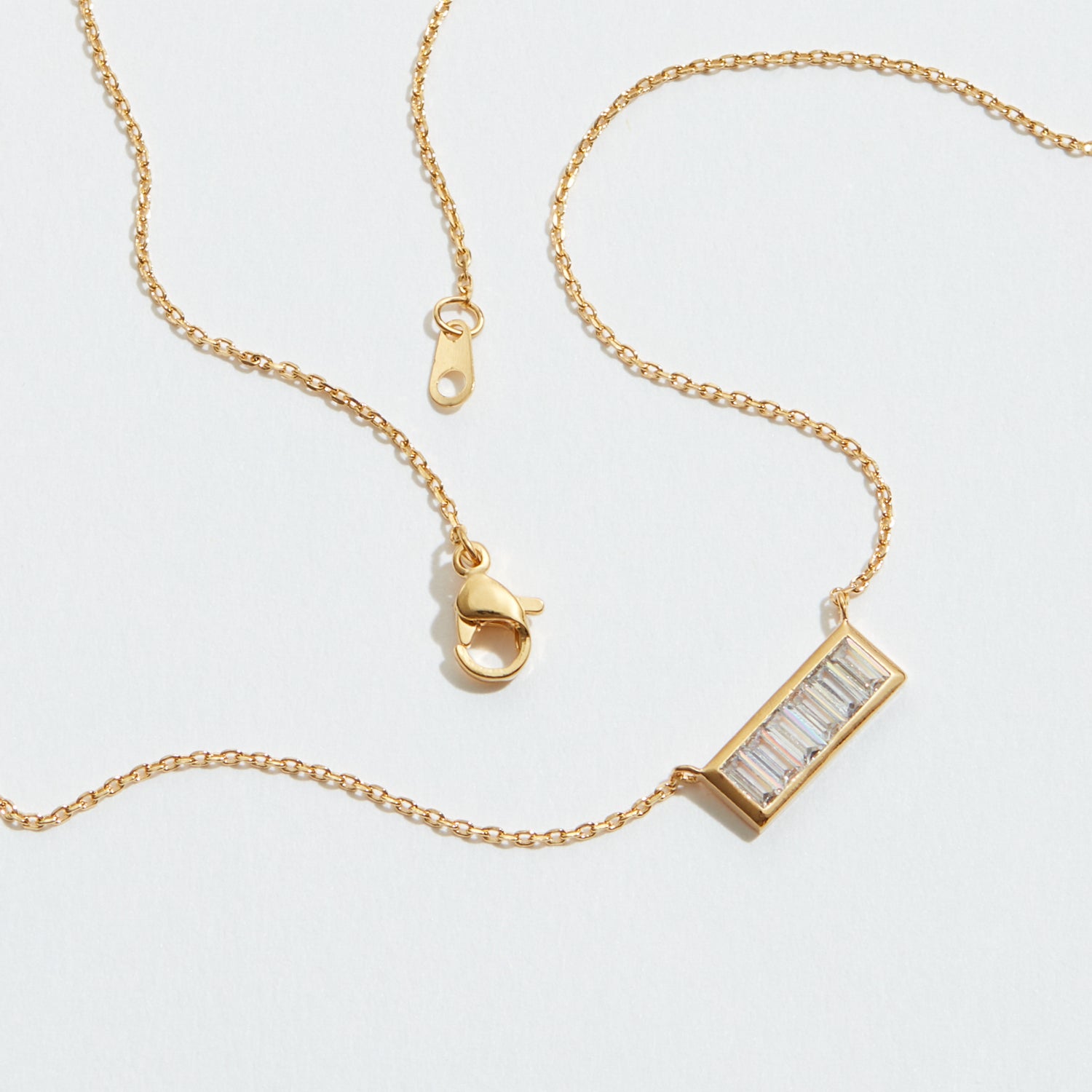 Gold Bar Pendant Necklace with Baguette Crystals