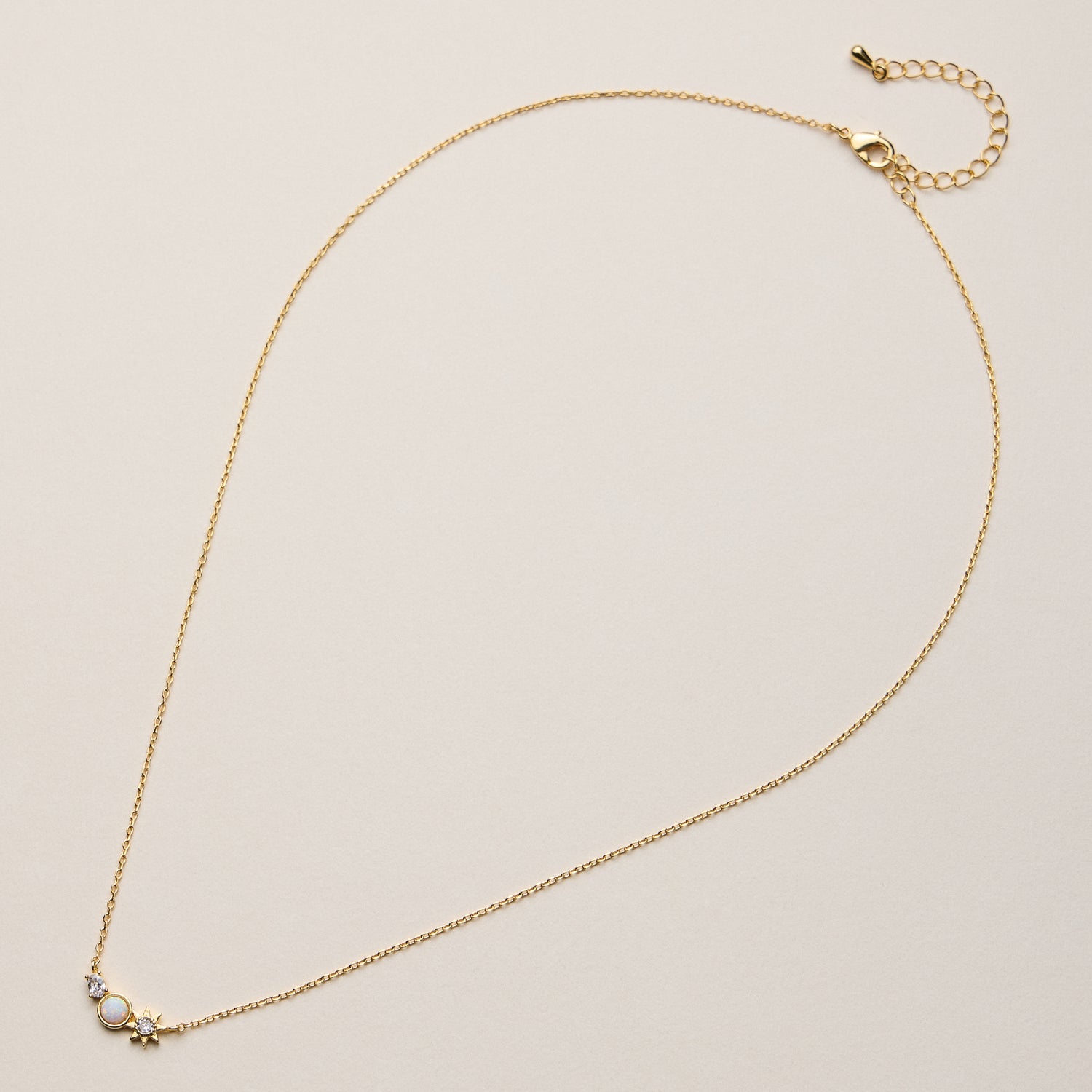 Gold Dipped Sun and Moon Charm Necklace