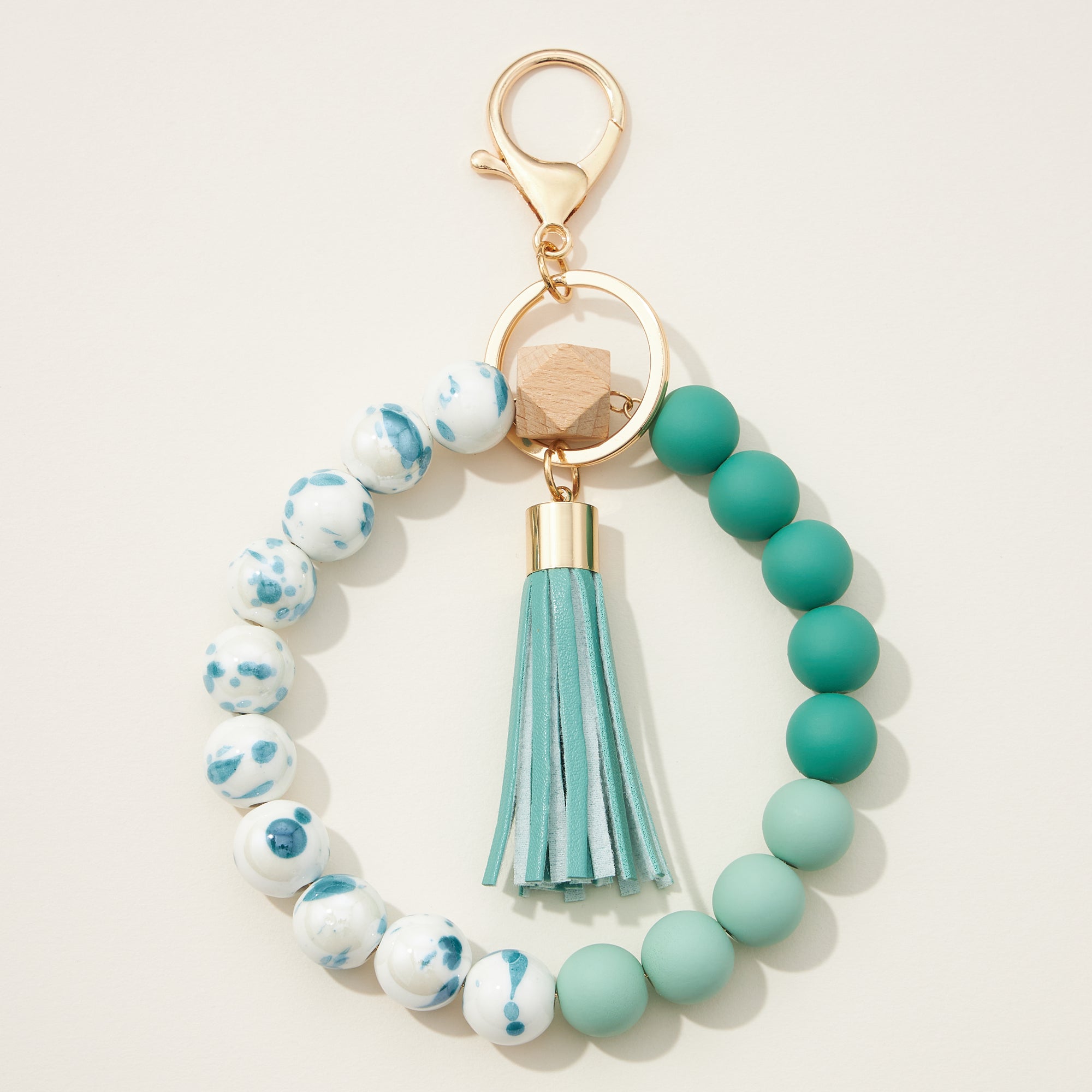 Ceramic and Silicone Coated Bead Bracelet Keychains with Tassel