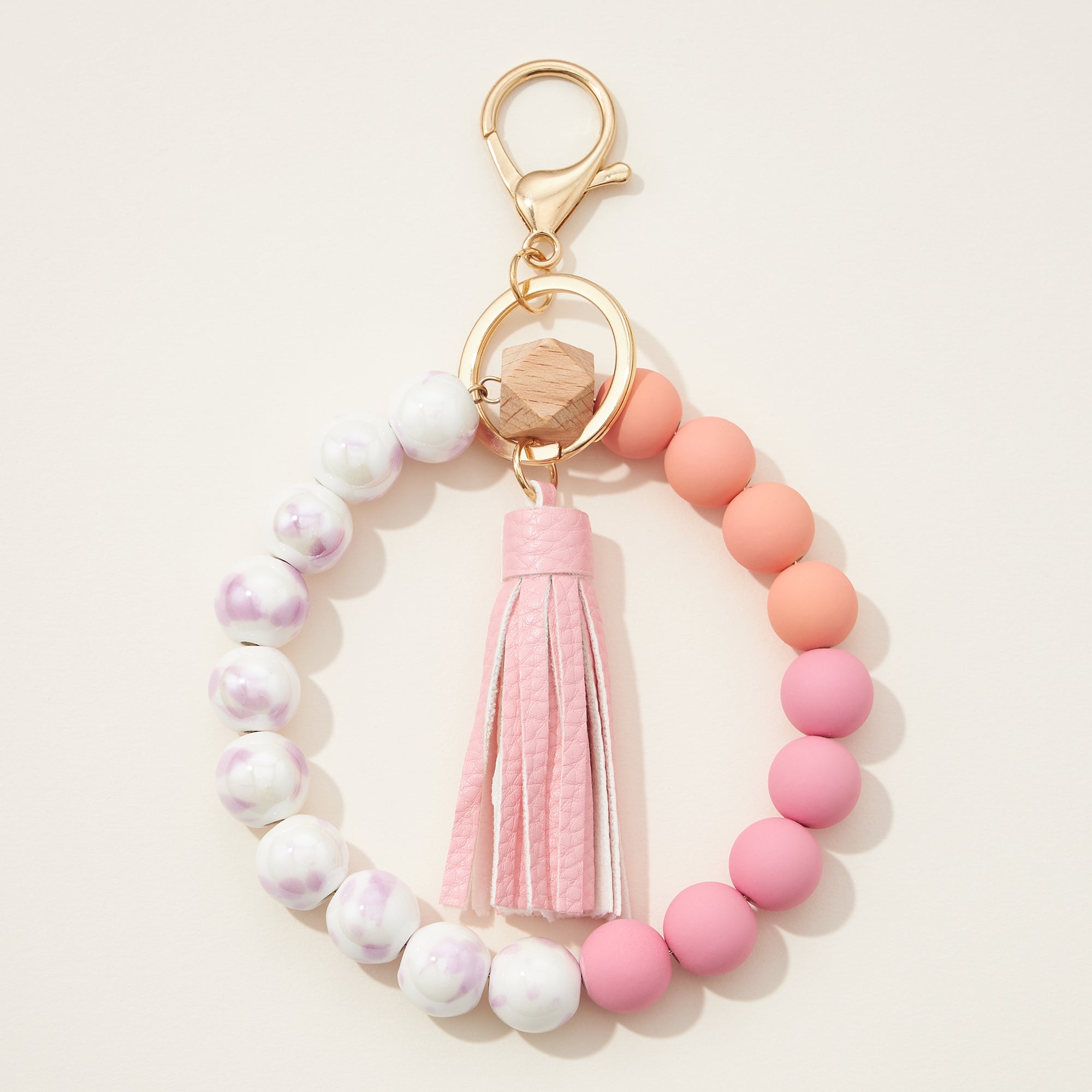 Ceramic and Silicone Coated Bead Bracelet Keychains with Tassel