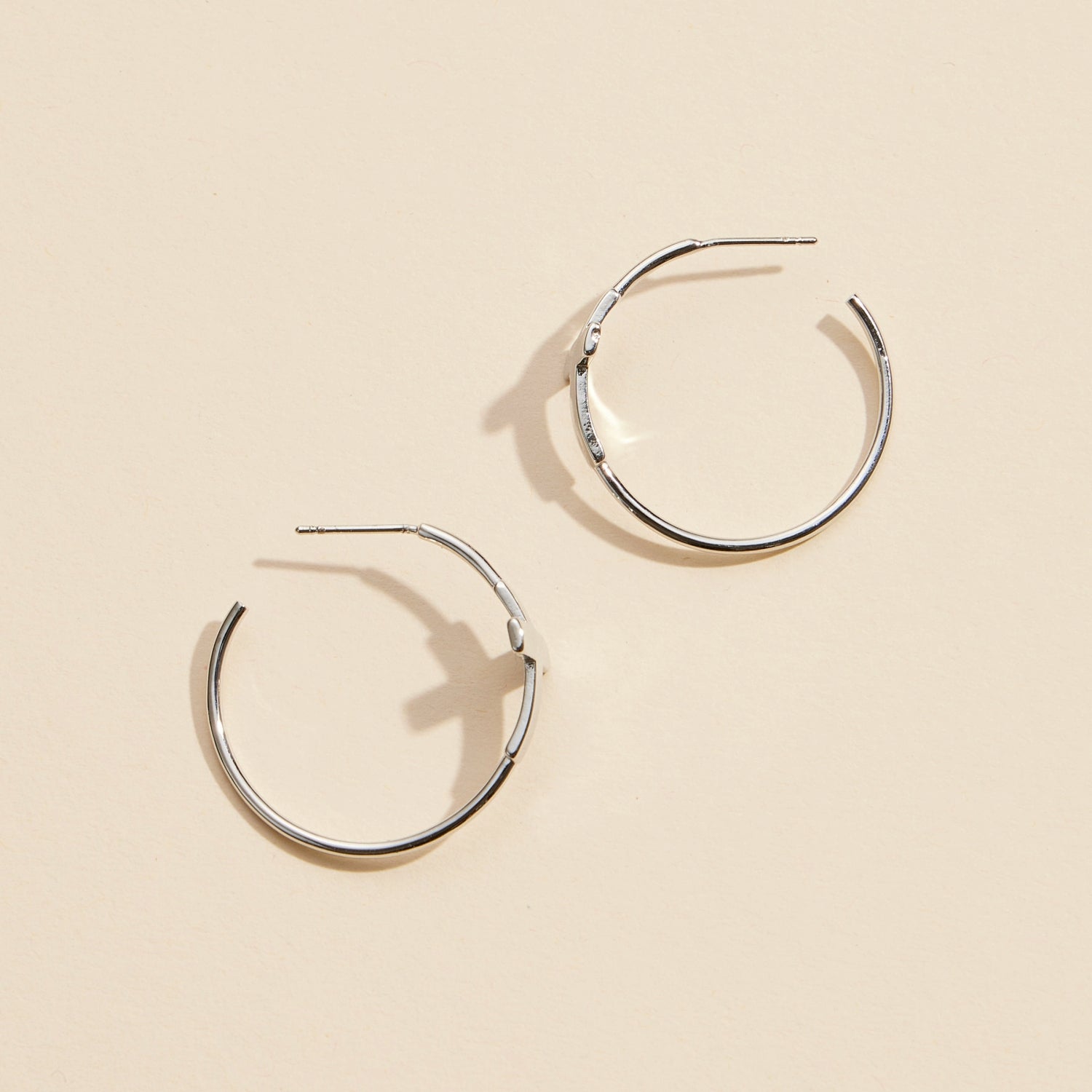 Sophisticated Gold & Silver Cross Hoop Earrings with CZ