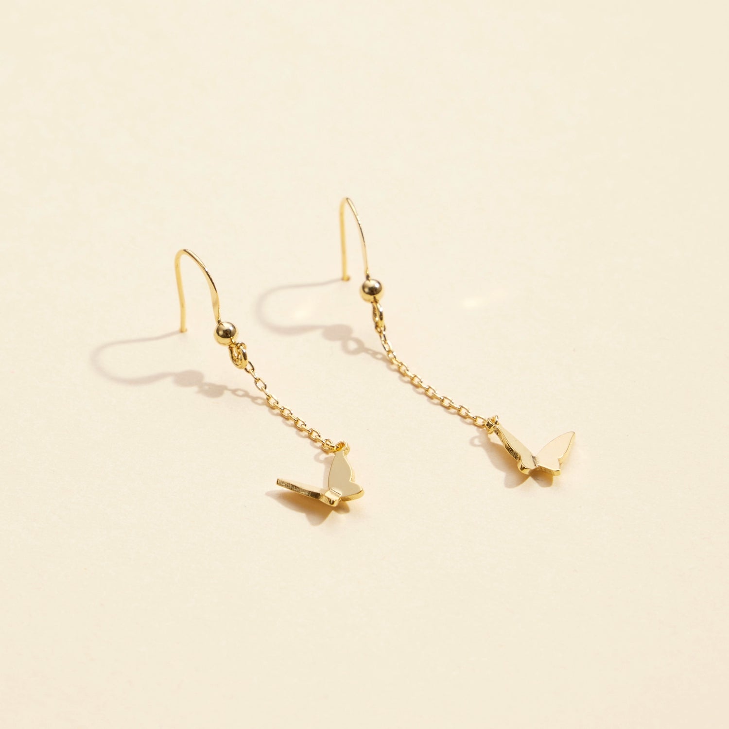 Elegant Butterfly Charm Gold-Dipped Drop Earrings