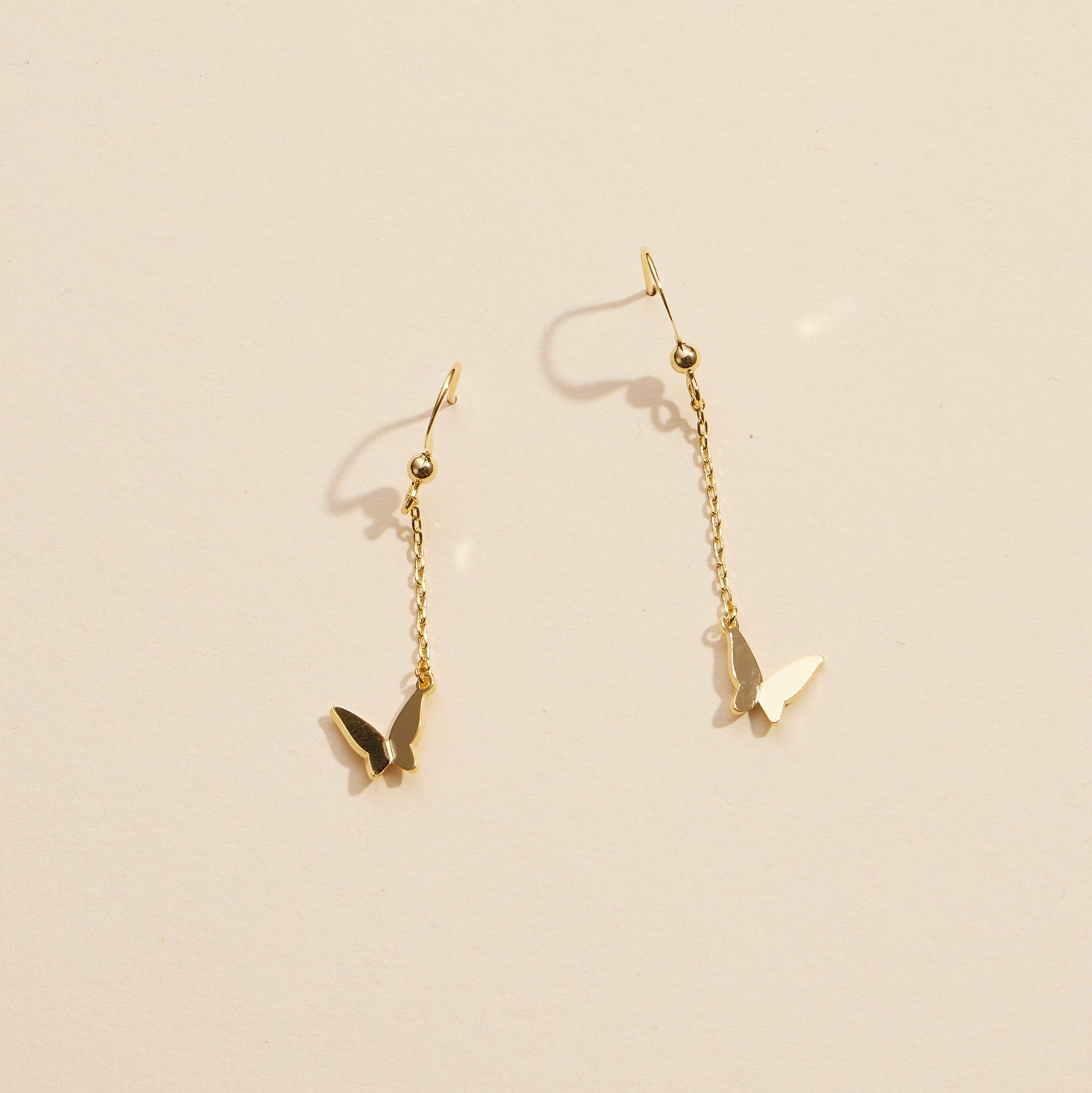 Elegant Butterfly Charm Gold-Dipped Drop Earrings