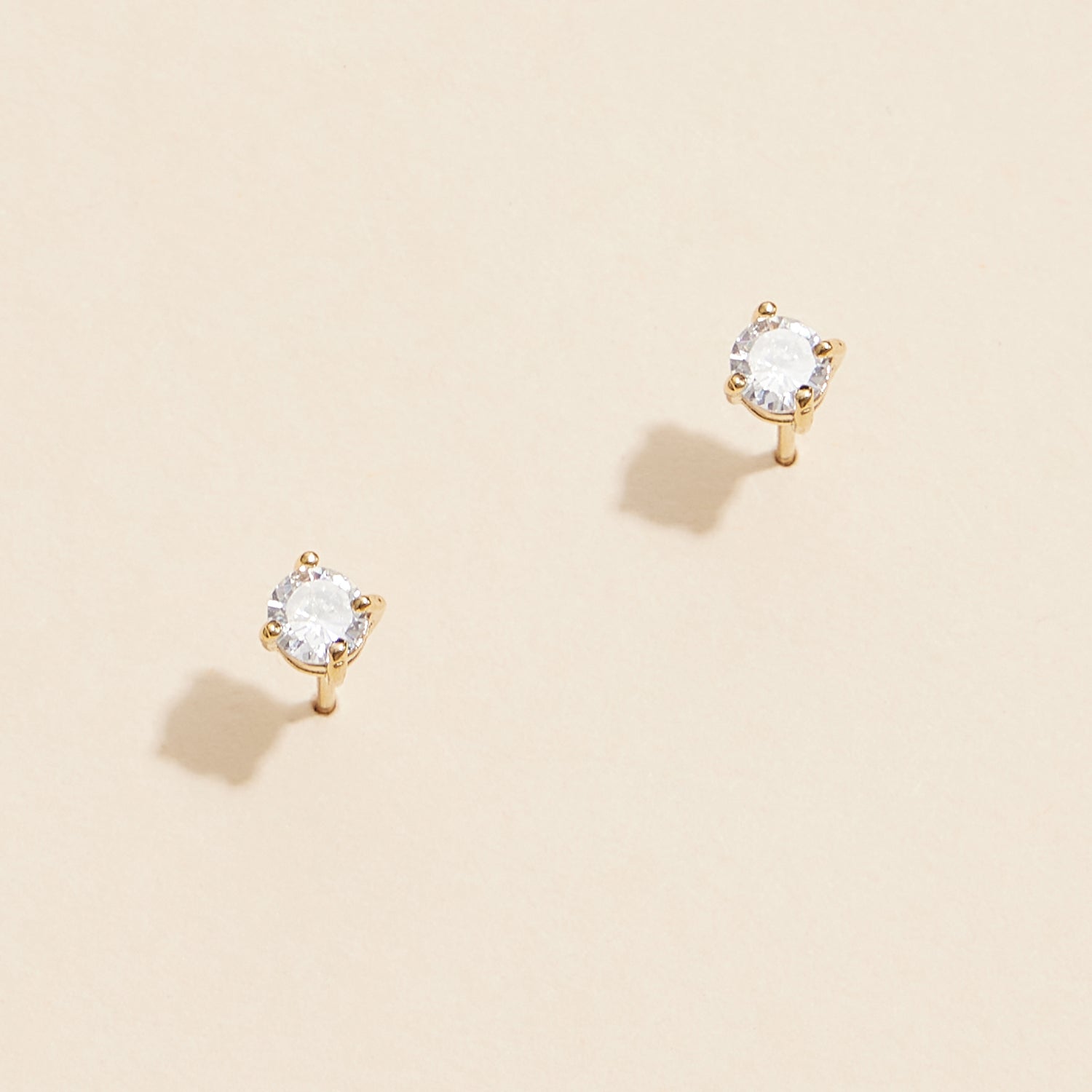 Timeless Gold and White Gold Stud Earrings with Sparkling Gemstones