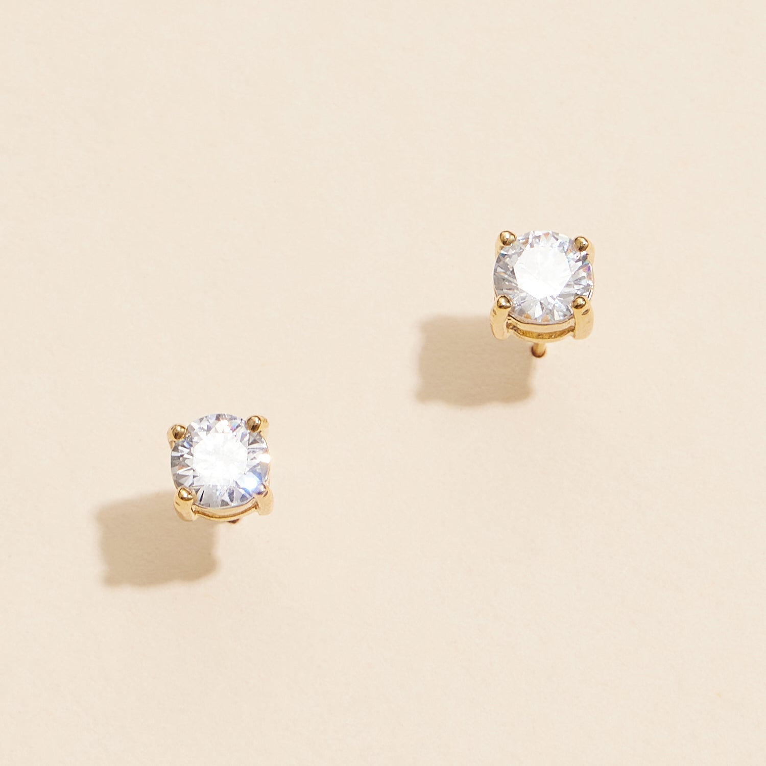 Sophisticated Gold and White Stud Earrings with Brilliant Gemstones