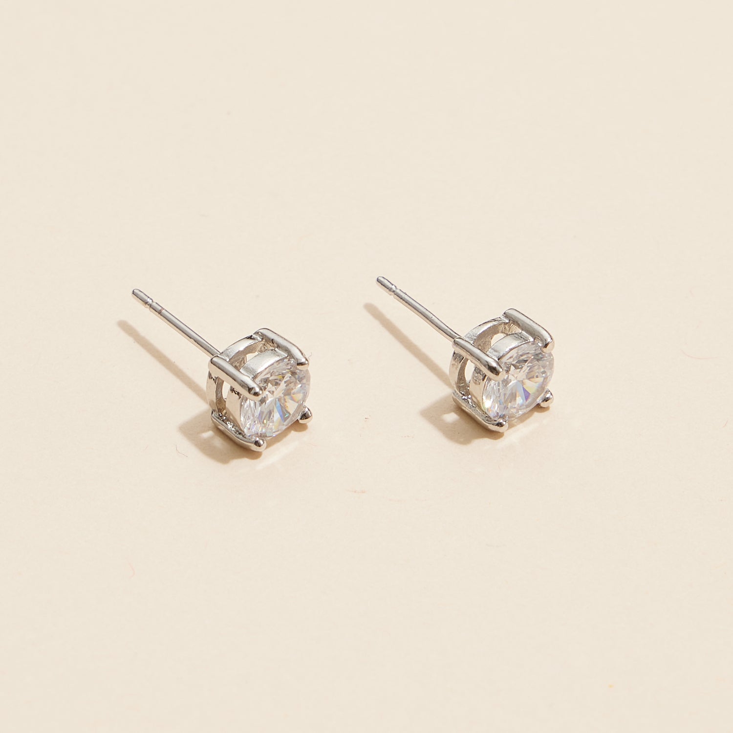 Sophisticated Gold and White Stud Earrings with Brilliant Gemstones